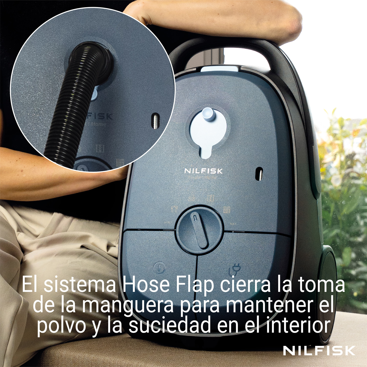 Aspiradora Nilfisk con solapa para mantener el polvo dentro.