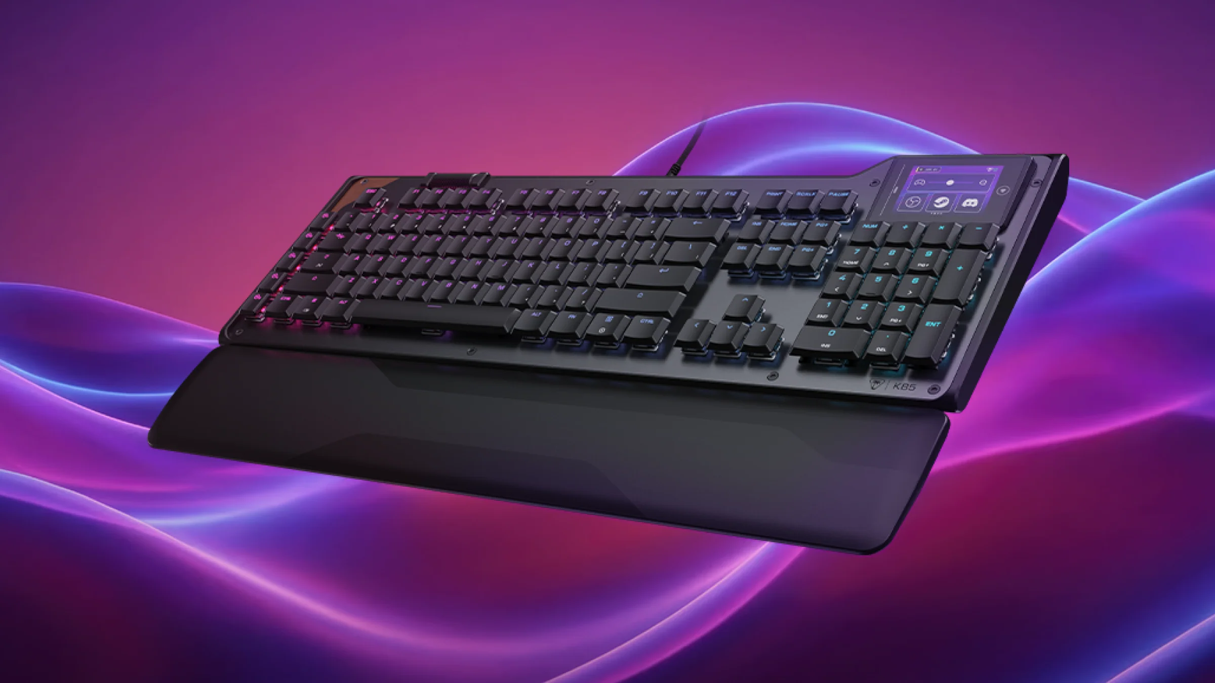 Un clavier de jeu noir avec écran intégré sur fond violet et bleu.