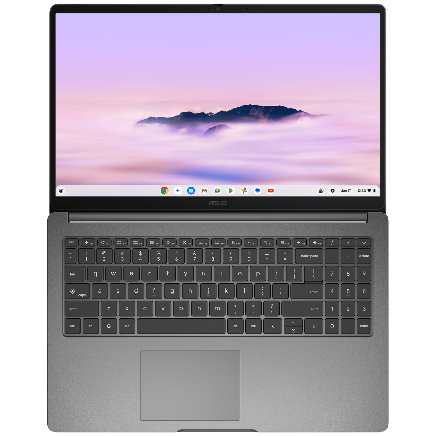 Een grijze laptop met een toetsenbord en een scherm met een bergachtig landschap.