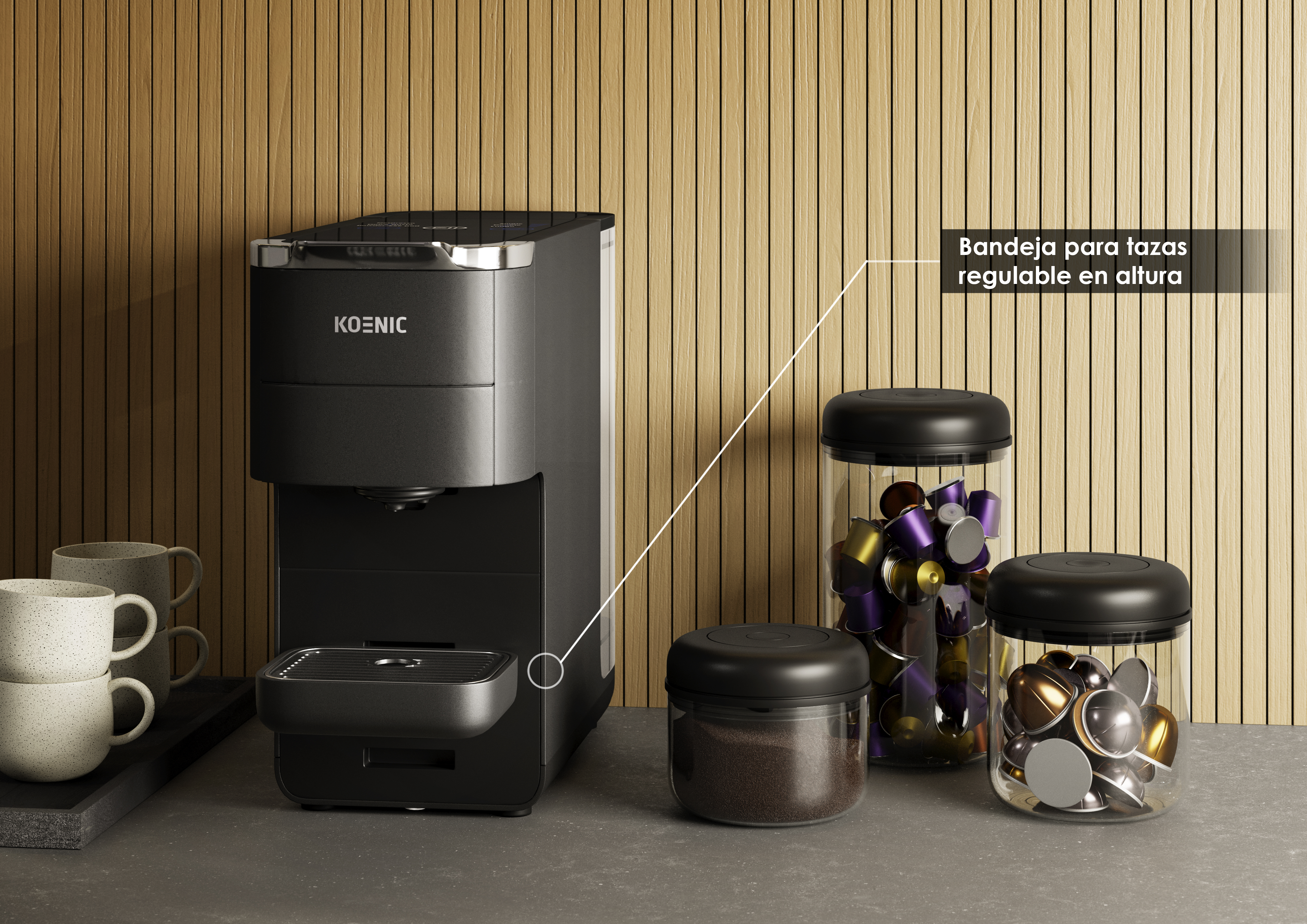 Una cafetera Koenic negra con tarros de cápsulas y café molido en una encimera contra una pared de madera.