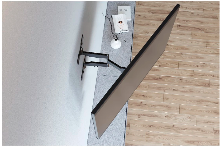 Ein an der Wand befestigter Fernseher auf einem verstellbaren Arm vor einer weißen Wand und Holzboden.
