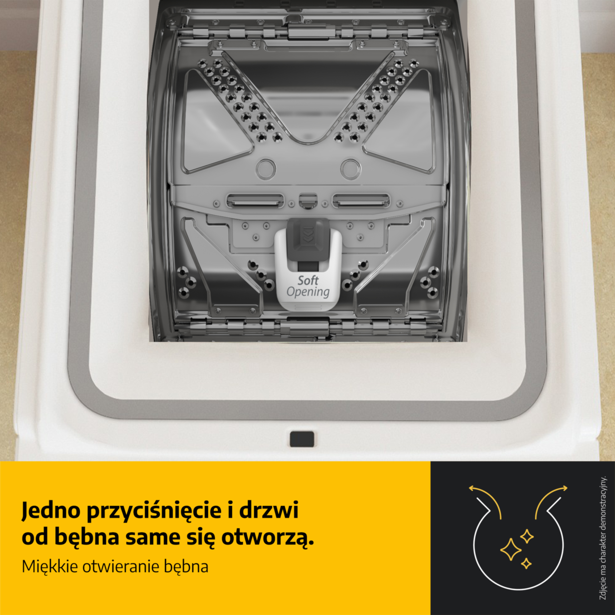 Widok z góry zamkniętego bębna pralki ładowanej od góry z uchwytem miękkiego otwierania.