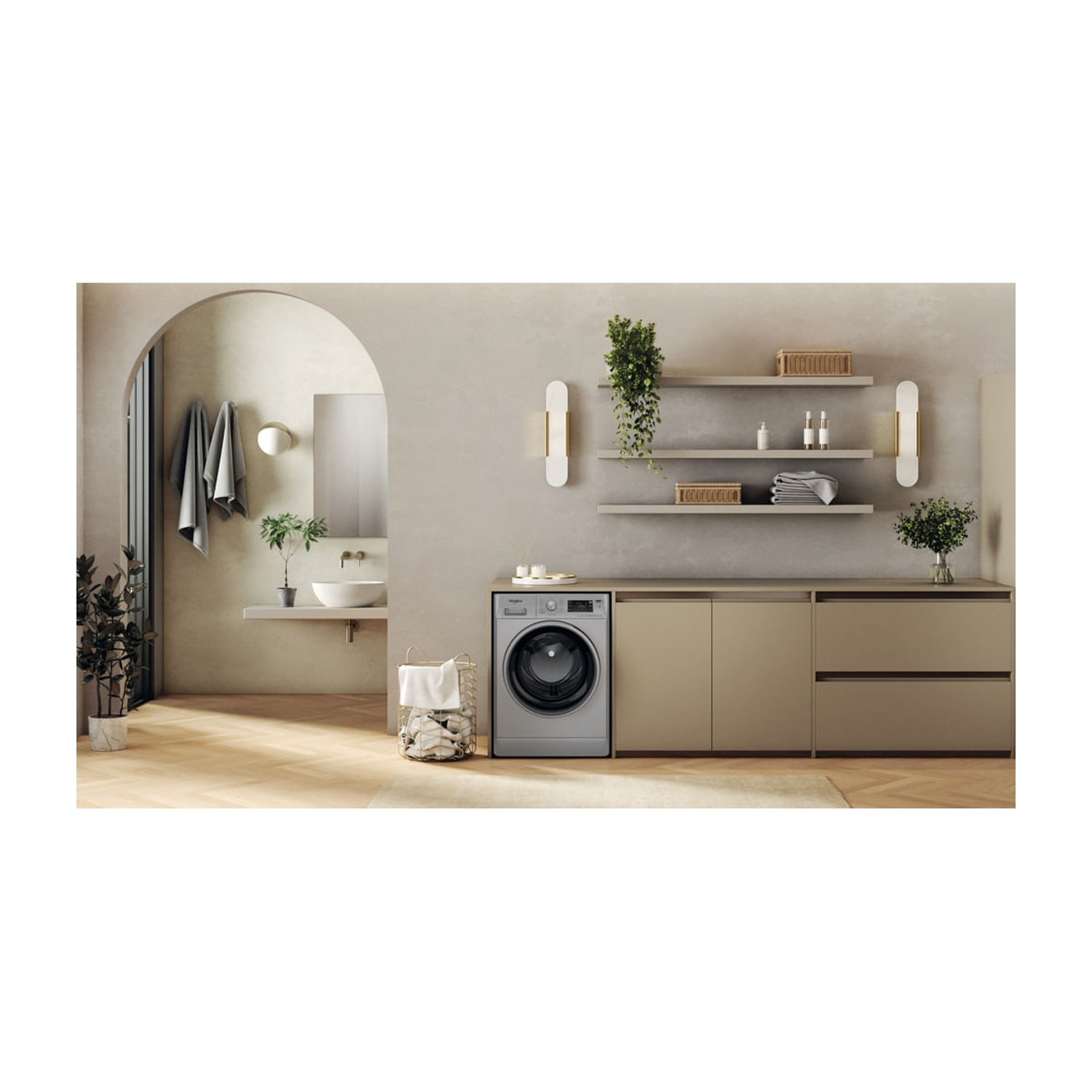 Una lavanderia moderna con lavatrice, mobili beige, mensole con decorazioni e un arco bagno collegato.