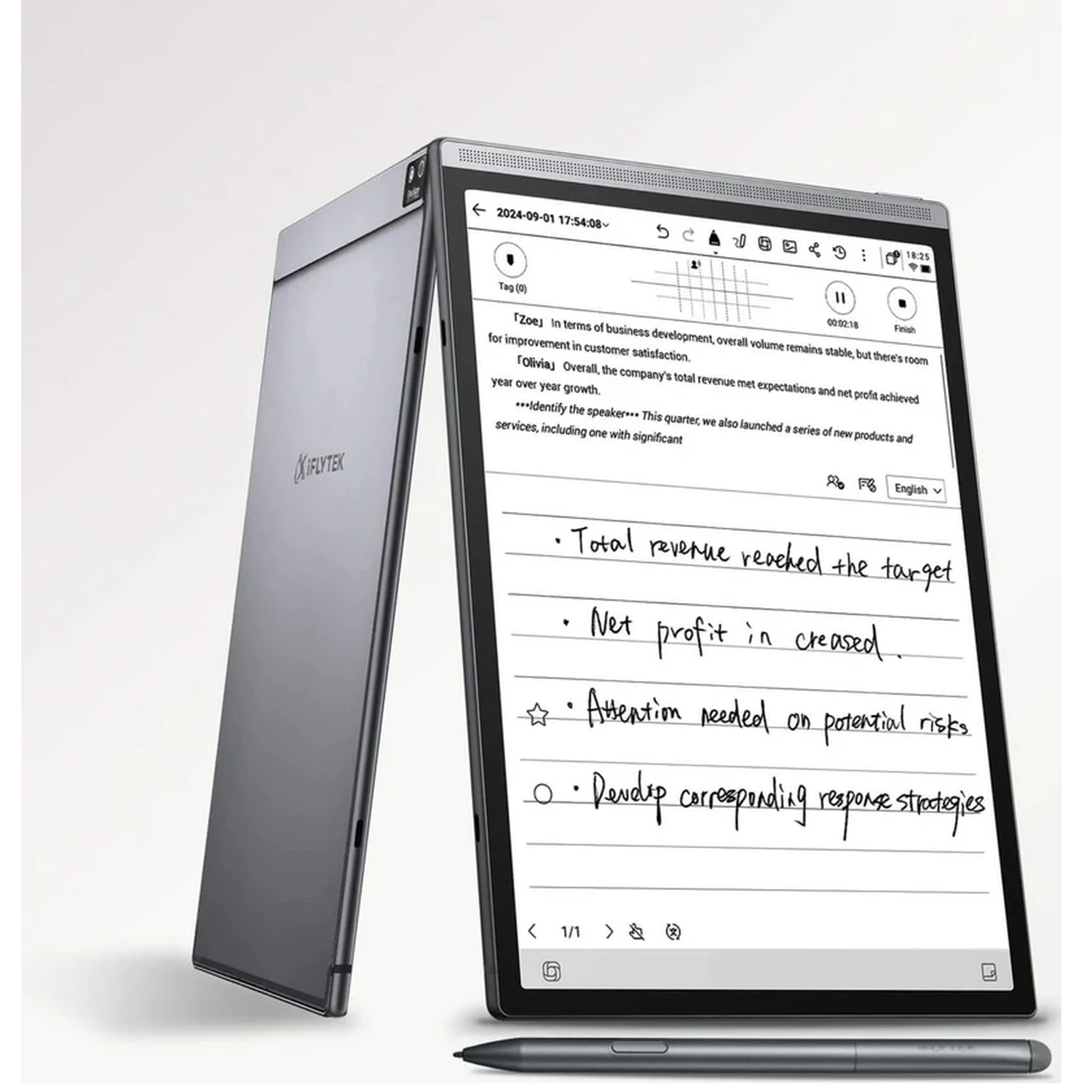 A silver e-note device with stylus displays handwritten notes and business text on the screen.