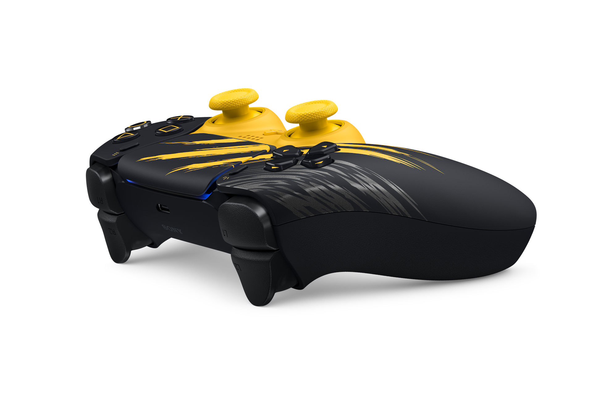 Ein schwarz-gelber PlayStation-Controller mit gelben Daumensticks und Aufdruck auf weißem Hintergrund.