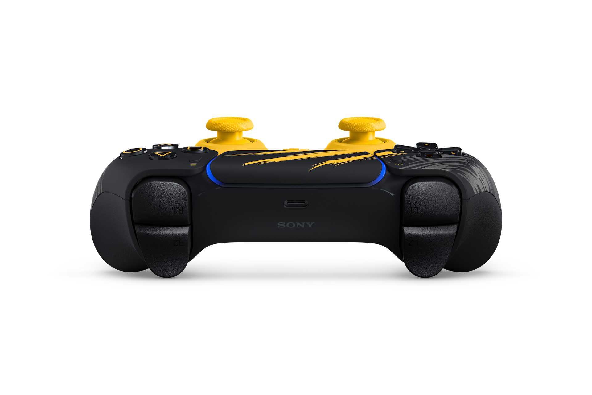 Ein schwarz-gelber Videospielcontroller mit gelben Daumensticks und Kratzspuren, von hinten gesehen.