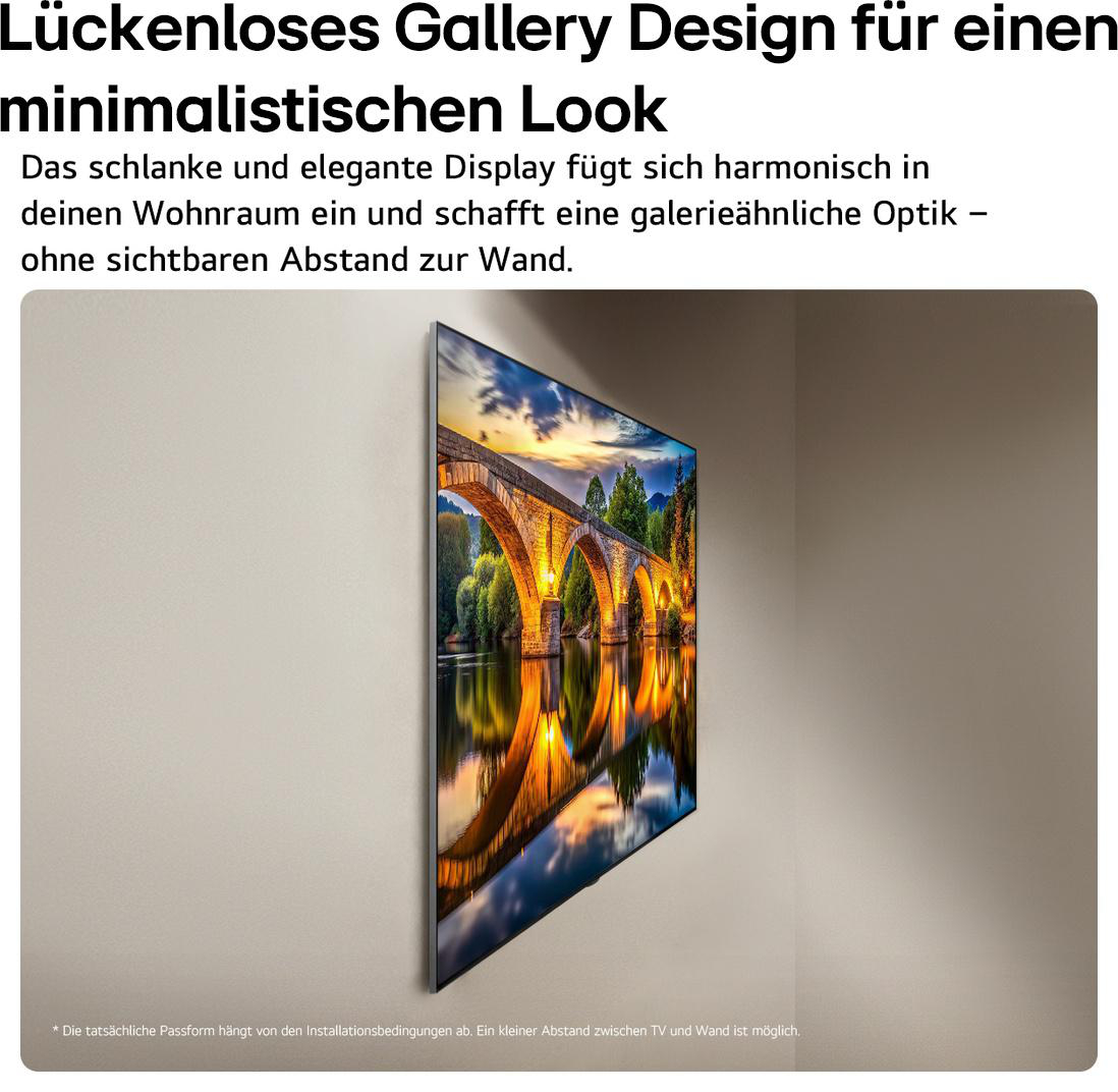 Ein schlanker TV an der Wand zeigt eine alte Steinbrücke über einem Fluss bei Sonnenuntergang.