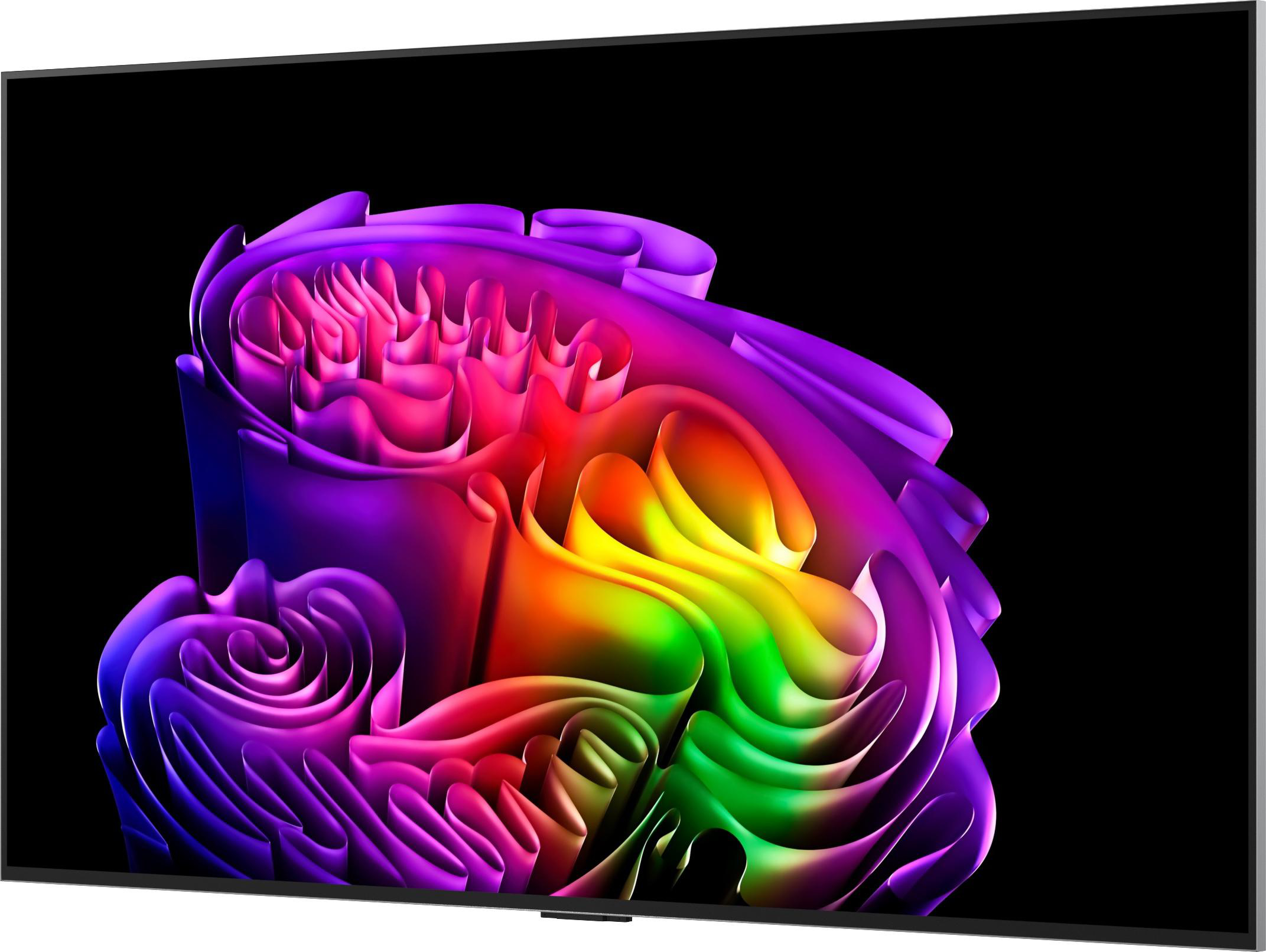 Ein Fernseher zeigt ein abstraktes, farbenfrohes Design aus wirbelnden, bunten Wellen auf schwarzem Hintergrund.