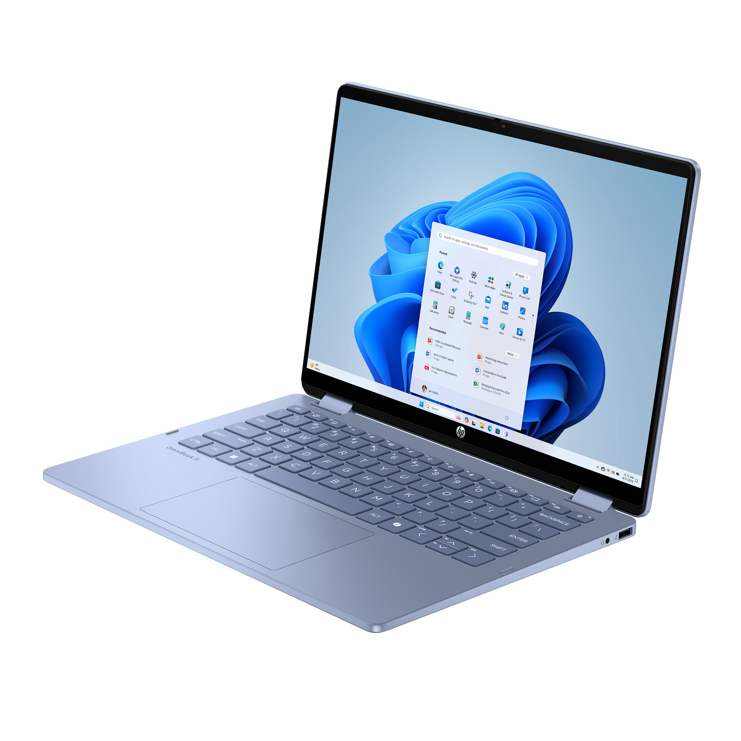 Portátil azul claro con pantalla abierta que muestra un fondo de pantalla azul de Windows sobre fondo blanco.