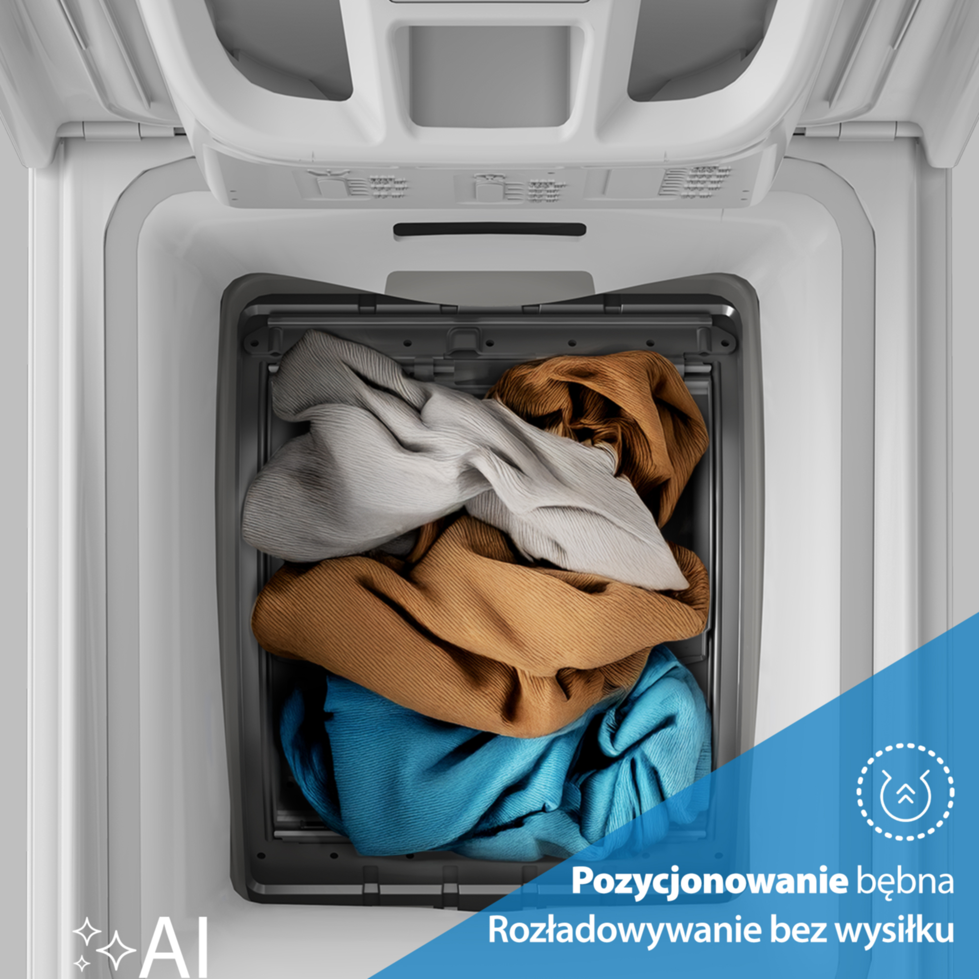 Bęben pralki ładowanej od góry wypełniony szarymi, brązowymi i niebieskimi ubraniami.