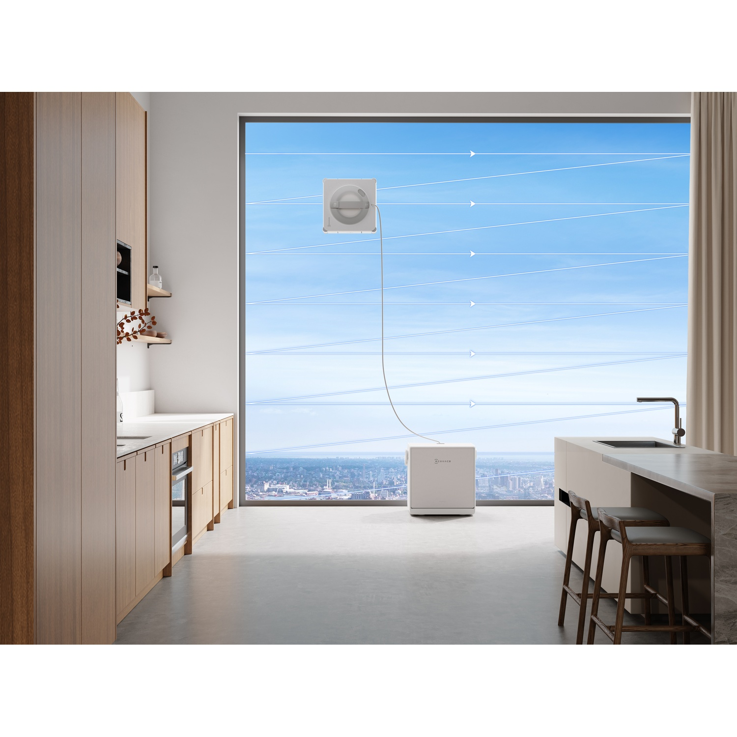 Un robot puliscitravi automatico pulisce l'ampia vetrata di una cucina moderna con vista sulla città.