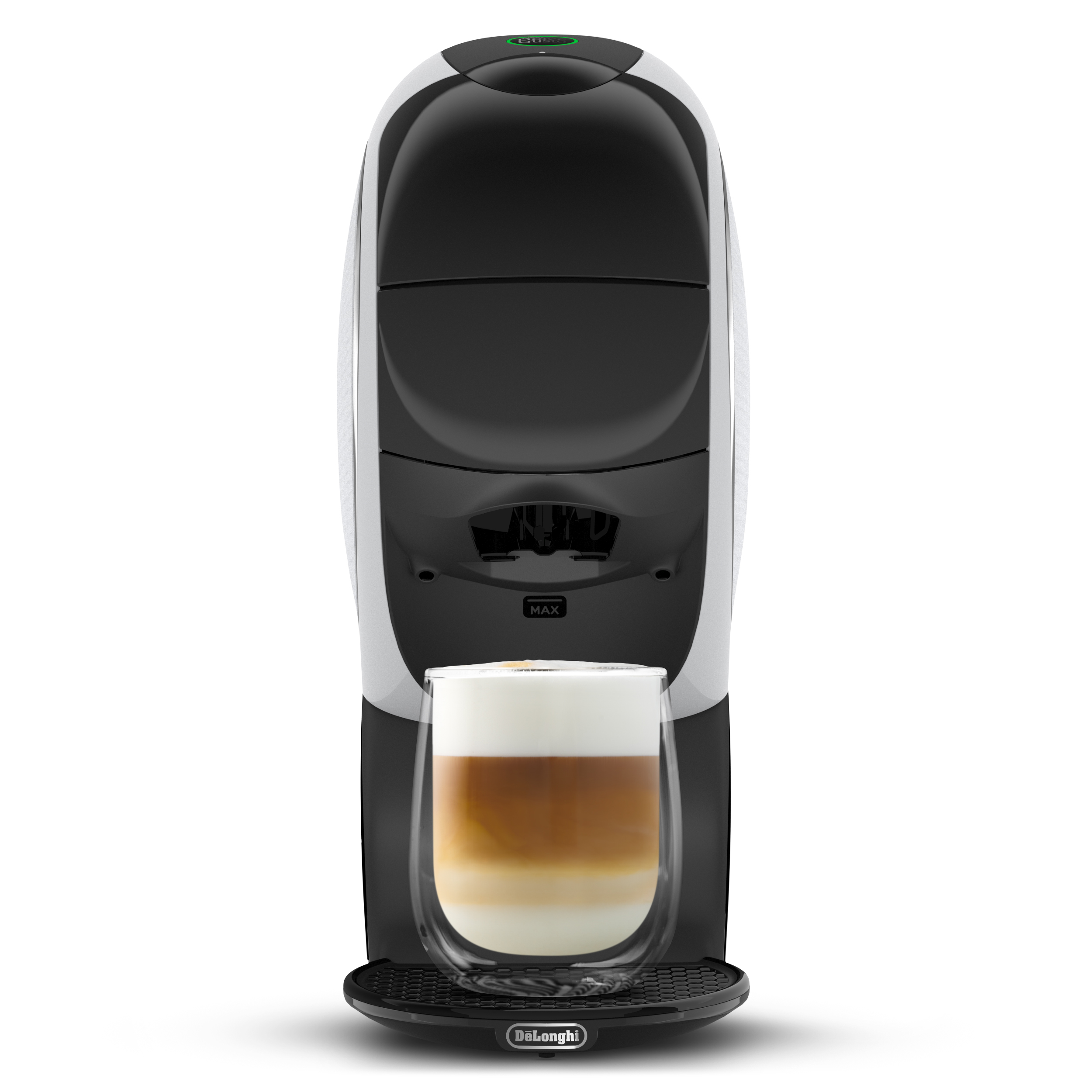 Cafetera moderna en blanco y negro con una taza de vidrio de latte macchiato en la bandeja de goteo.