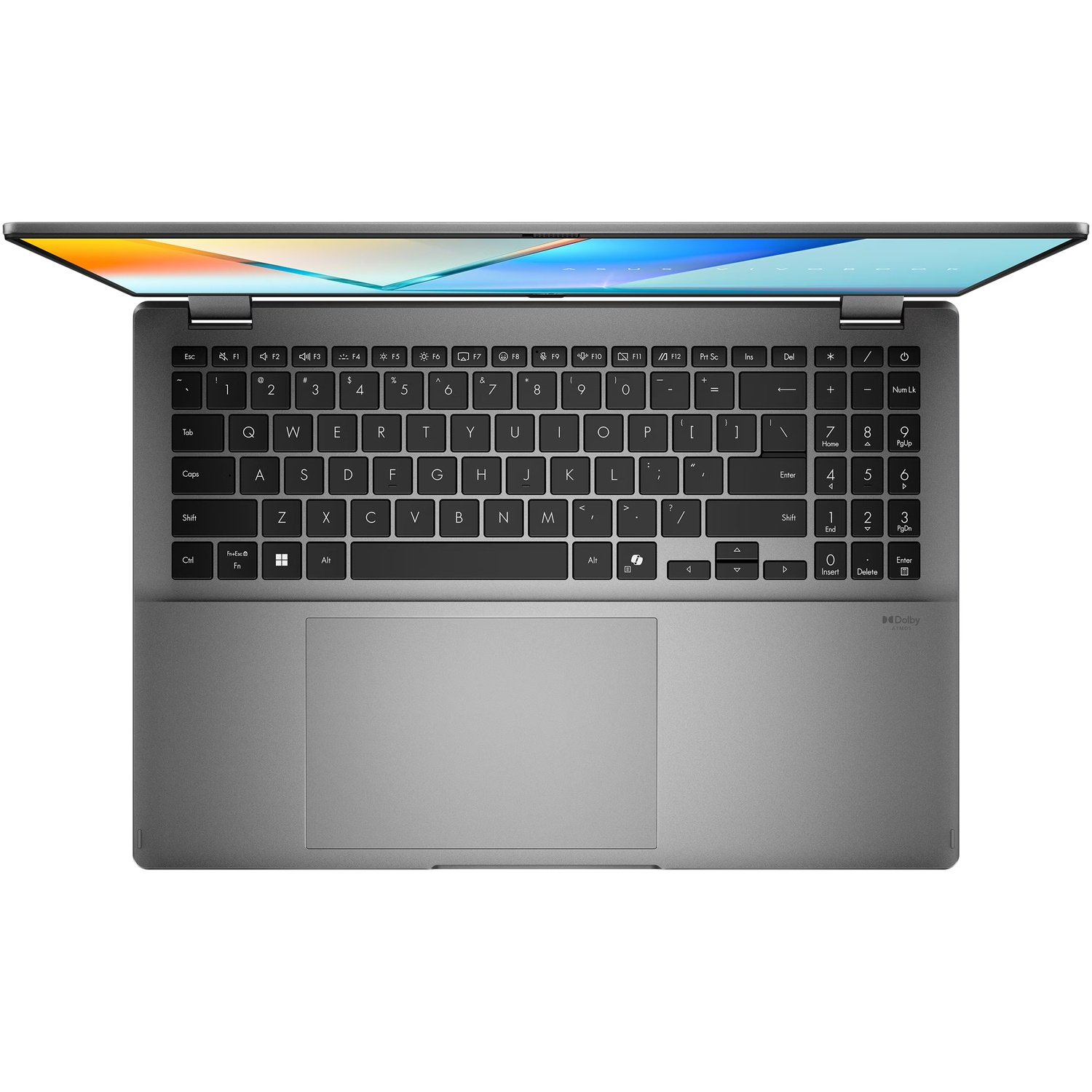 Vue de dessus d'un ordinateur portable gris avec un clavier complet, un pavé numérique et un écran coloré ouvert.