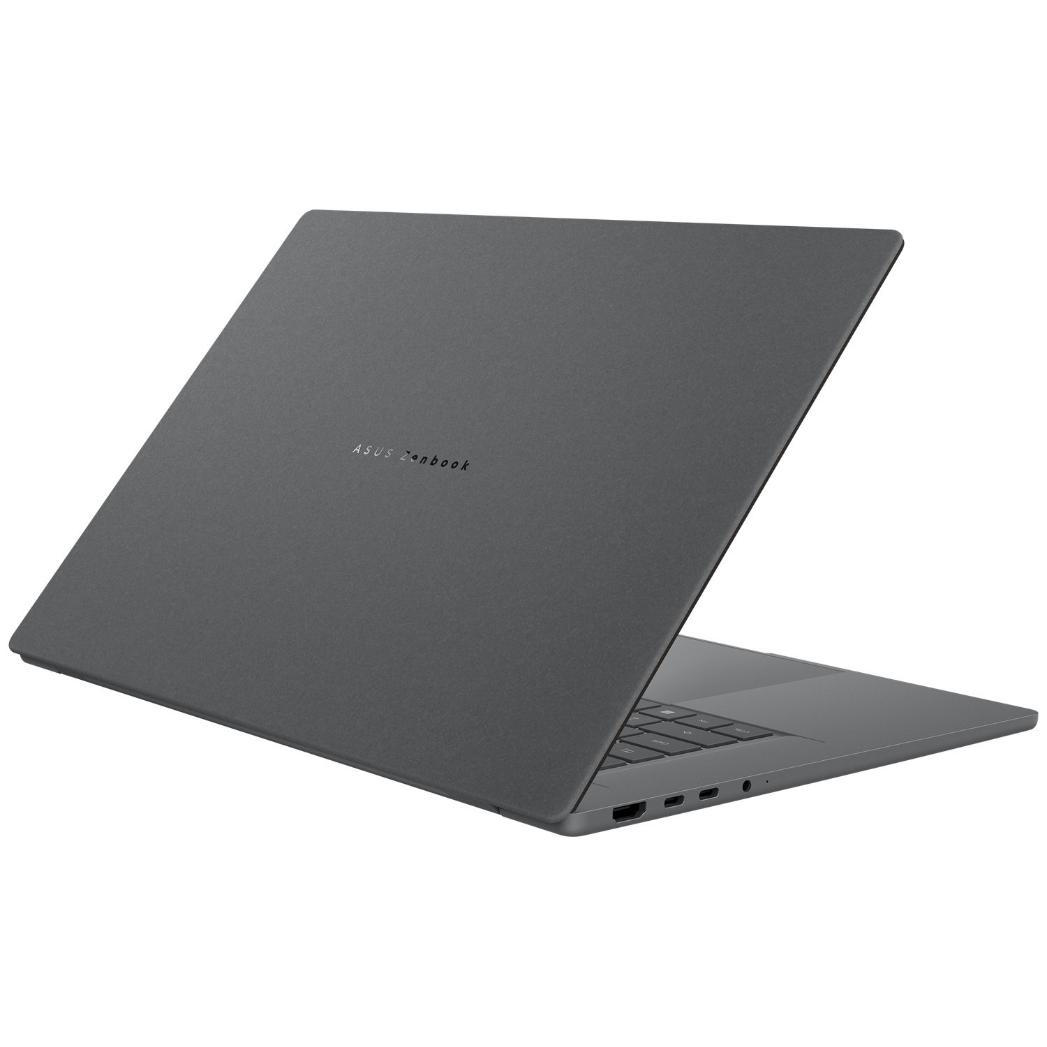 Een grijze Asus Zenbook laptop staat open op een witte ondergrond, het toetsenbord is gedeeltelijk zichtbaar.