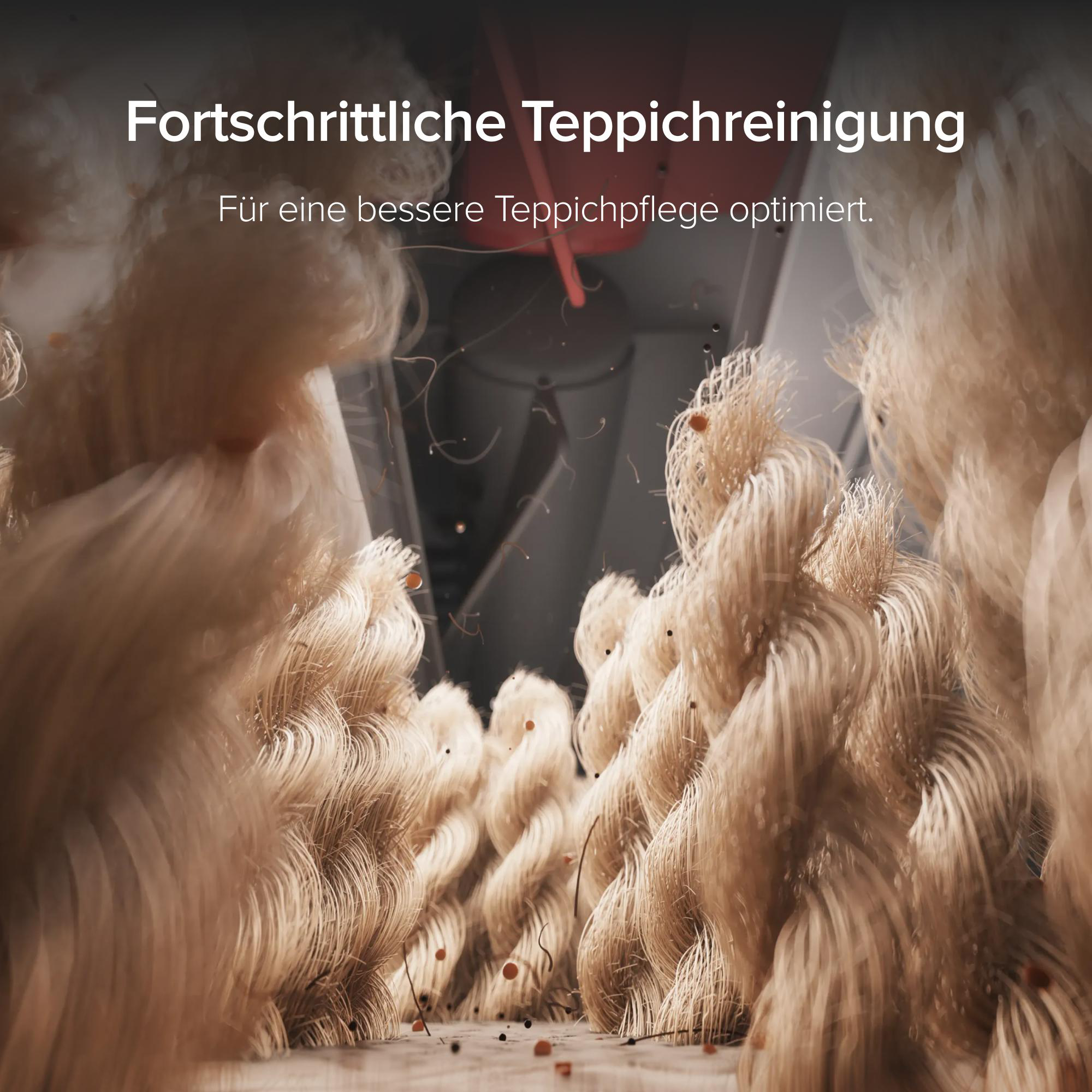 Nahaufnahme von Teppichfasern, die durch einen Staubsauger gereinigt werden, mit Text oben.