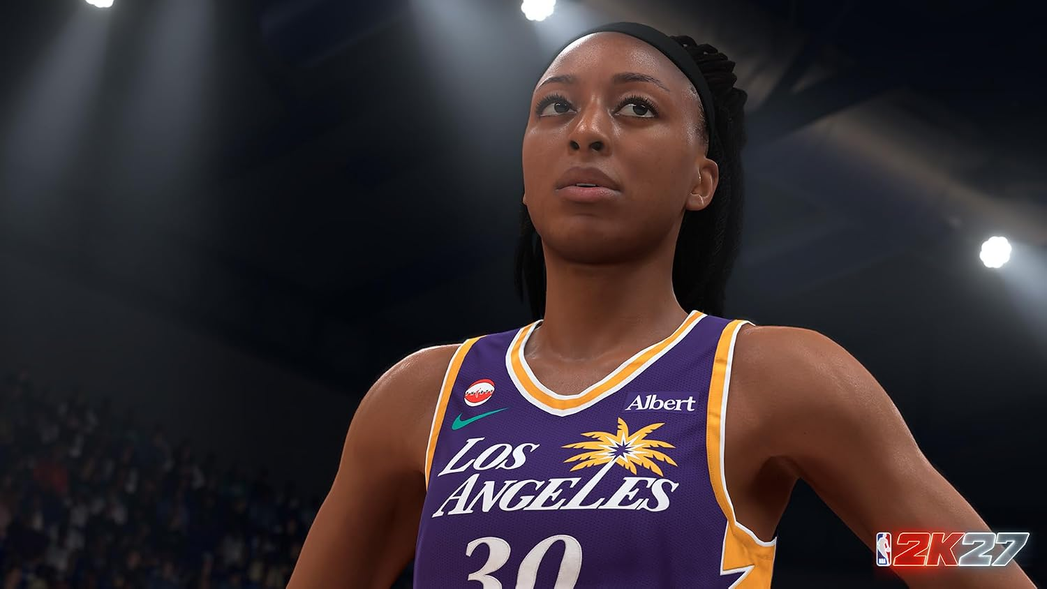 Una giocatrice di basket di Los Angeles con maglia viola, bordi gialli e numero 30 in campo.