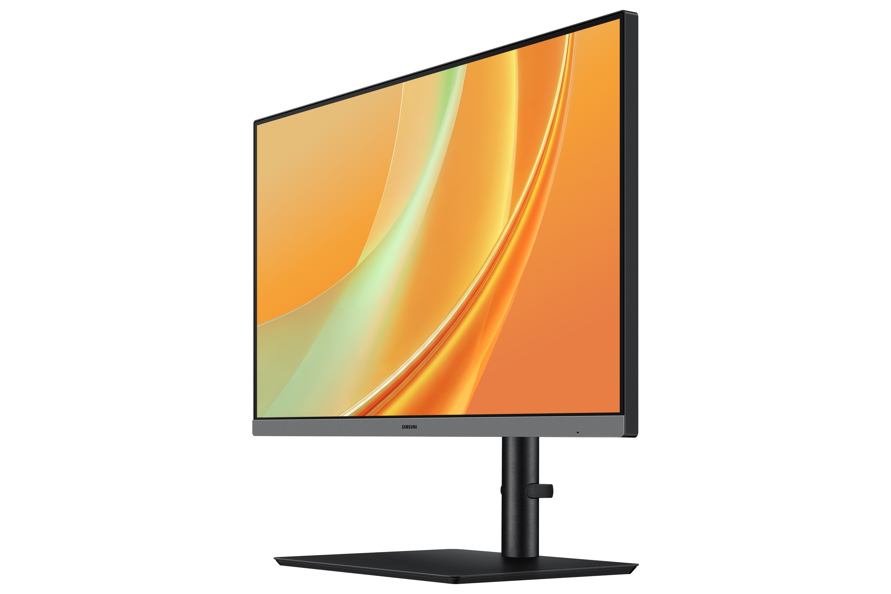A Samsung monitor displaying an orange and yellow abstract background.