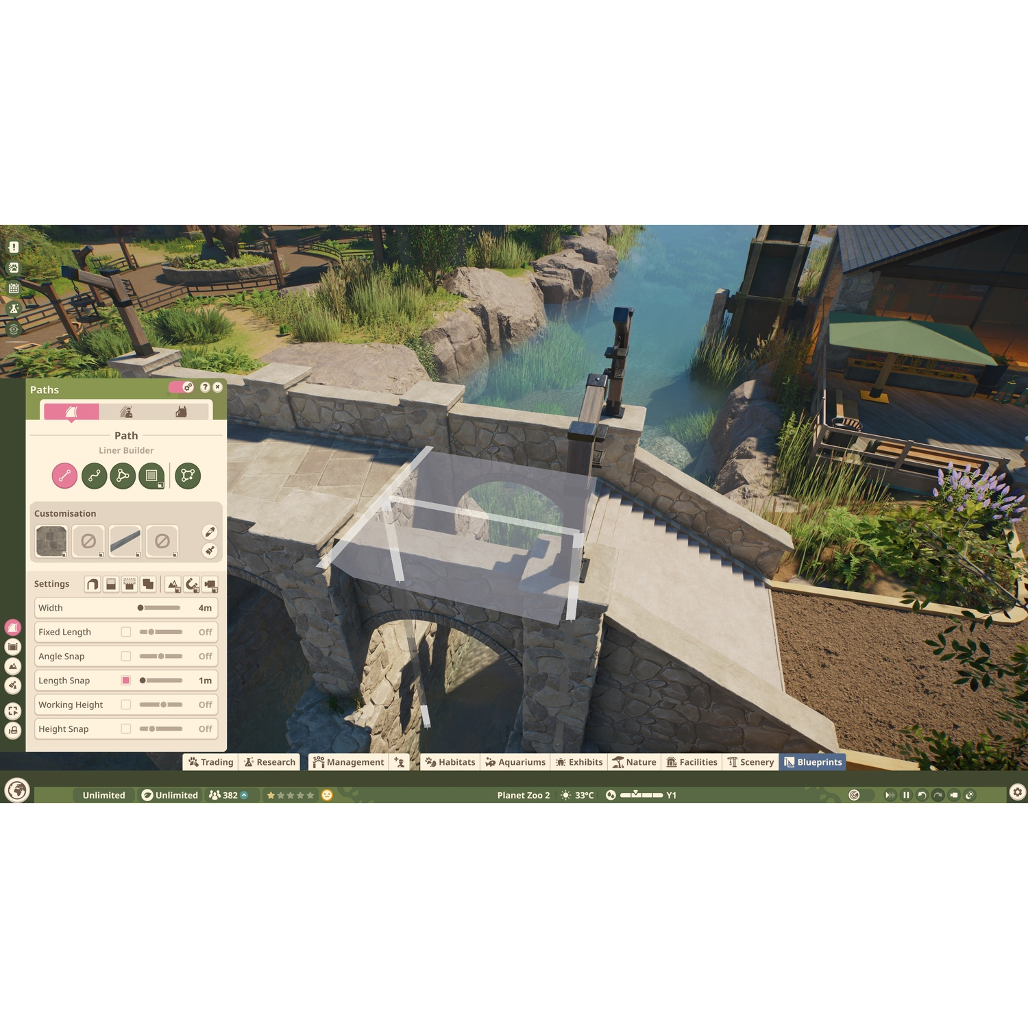 Capture d'écran de Planet Zoo montrant la construction d'un pont sur une rivière avec le menu des chemins ouvert.