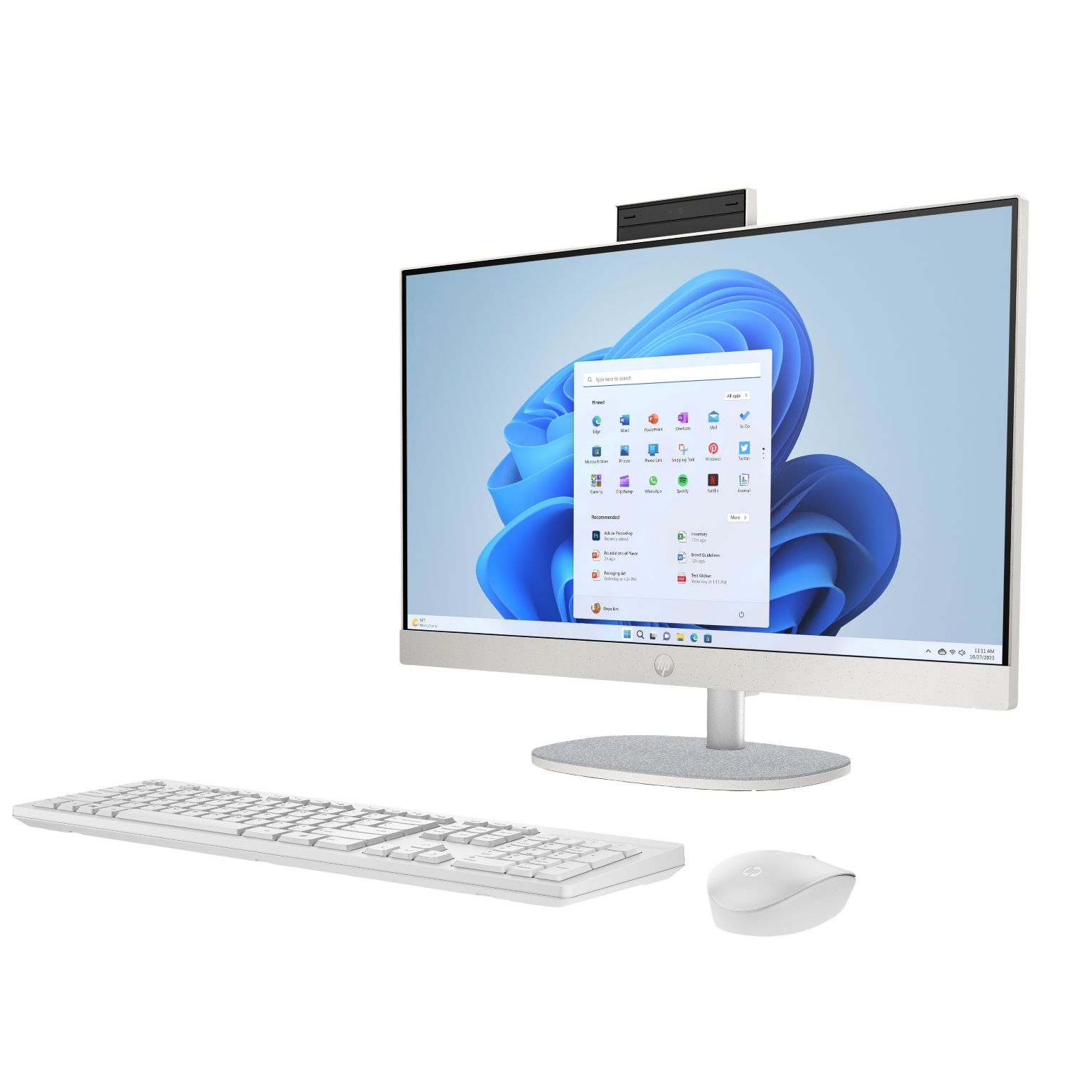 Un ordenador de sobremesa todo en uno blanco con teclado y ratón sobre fondo blanco.