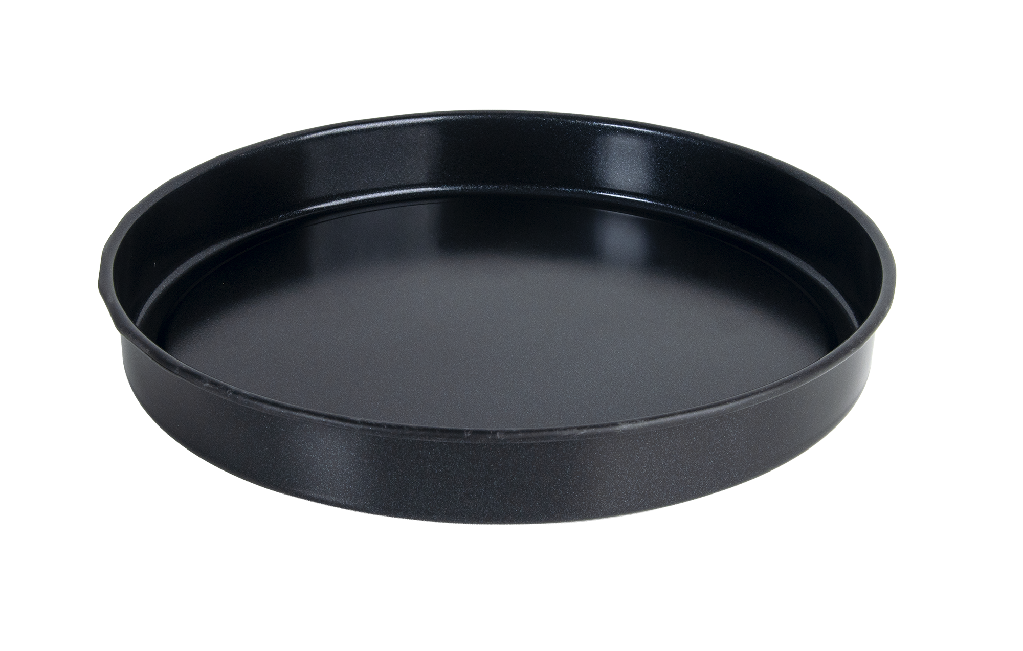 Un moule à gâteau rond et noir sur fond noir.