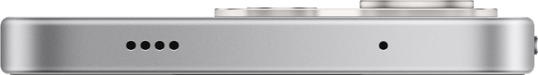 Seitenansicht eines silbernen Smartphones mit Lautsprecheröffnungen und Mikrofonloch auf schwarzem Hintergrund.