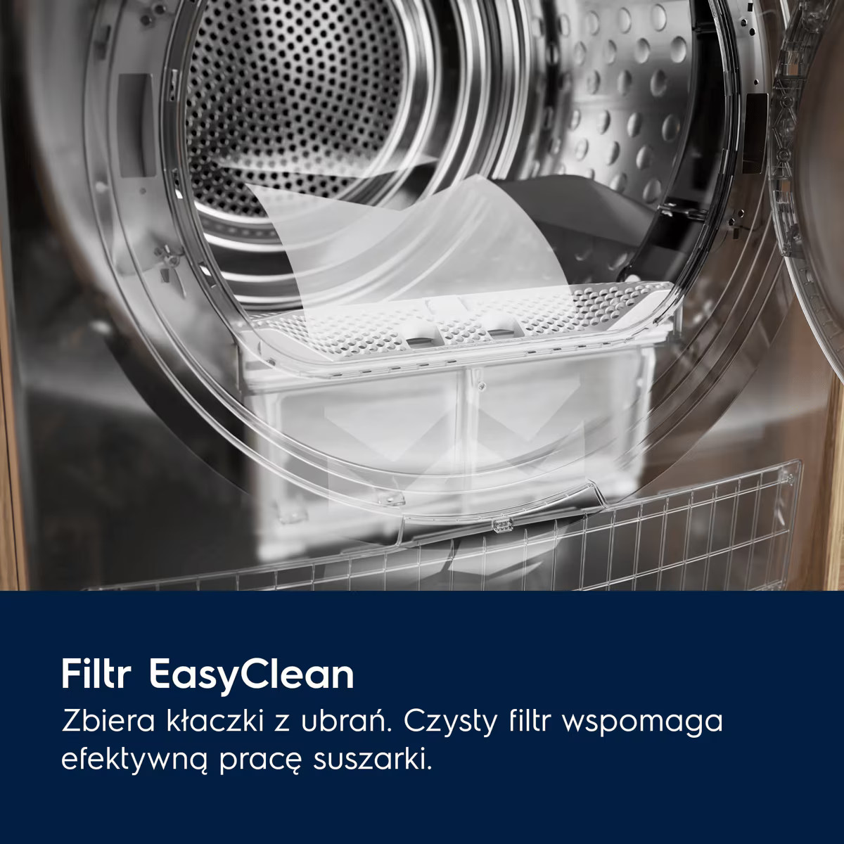 Zbliżenie otwartego bębna suszarki z filtrem EasyClean i arkuszem do suszarki.