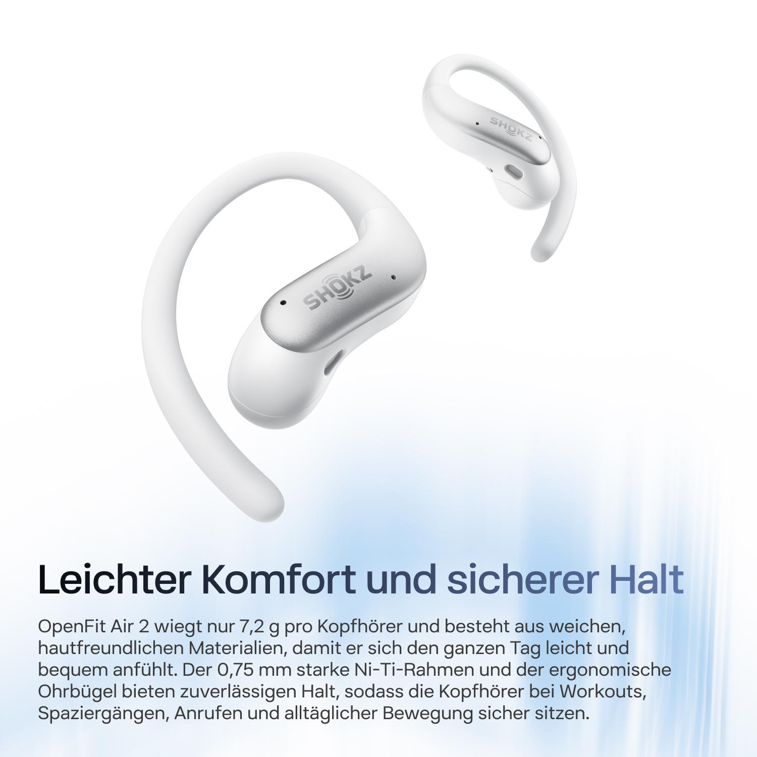 Zwei weiße Shokz OpenFit Air 2 Kopfhörer mit Ohrbügeln vor weißem Hintergrund und deutschem Werbetext.