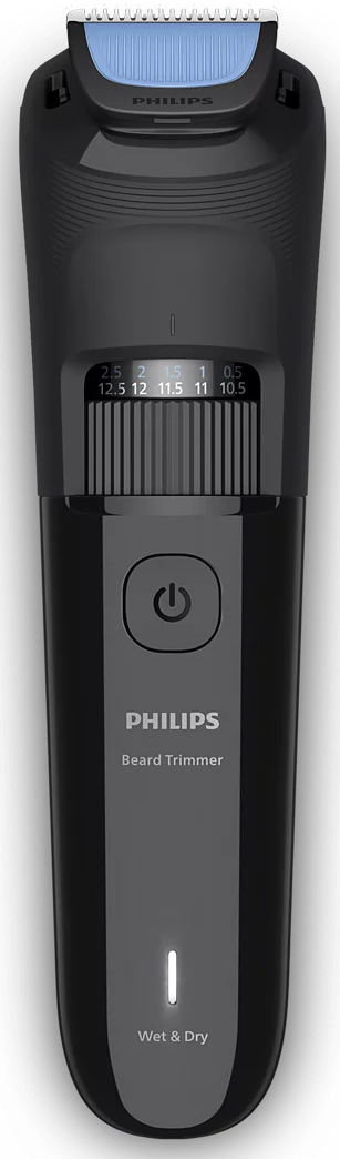 Schwarzer Philips Barttrimmer mit Längeneinstellrad, Ein-Ausschalter und LED-Anzeige vor schwarzem Hintergrund.