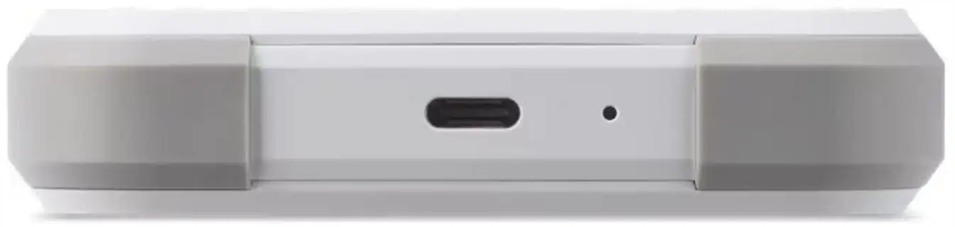 Primo piano del bordo di un dispositivo bianco con porta USB-C e piccolo indicatore LED tra paraurti grigi.