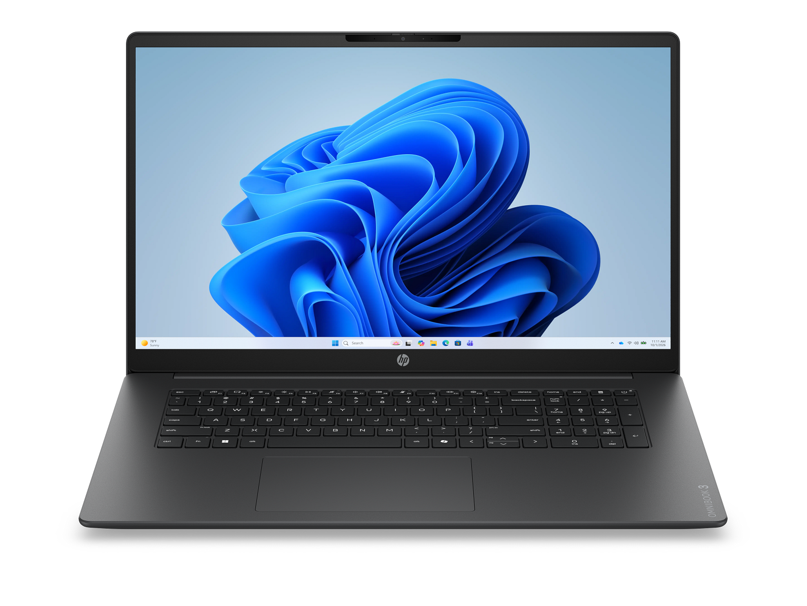 Czarny laptop z niebieską, abstrakcyjną tapetą z falami na ekranie i widoczną klawiaturą.