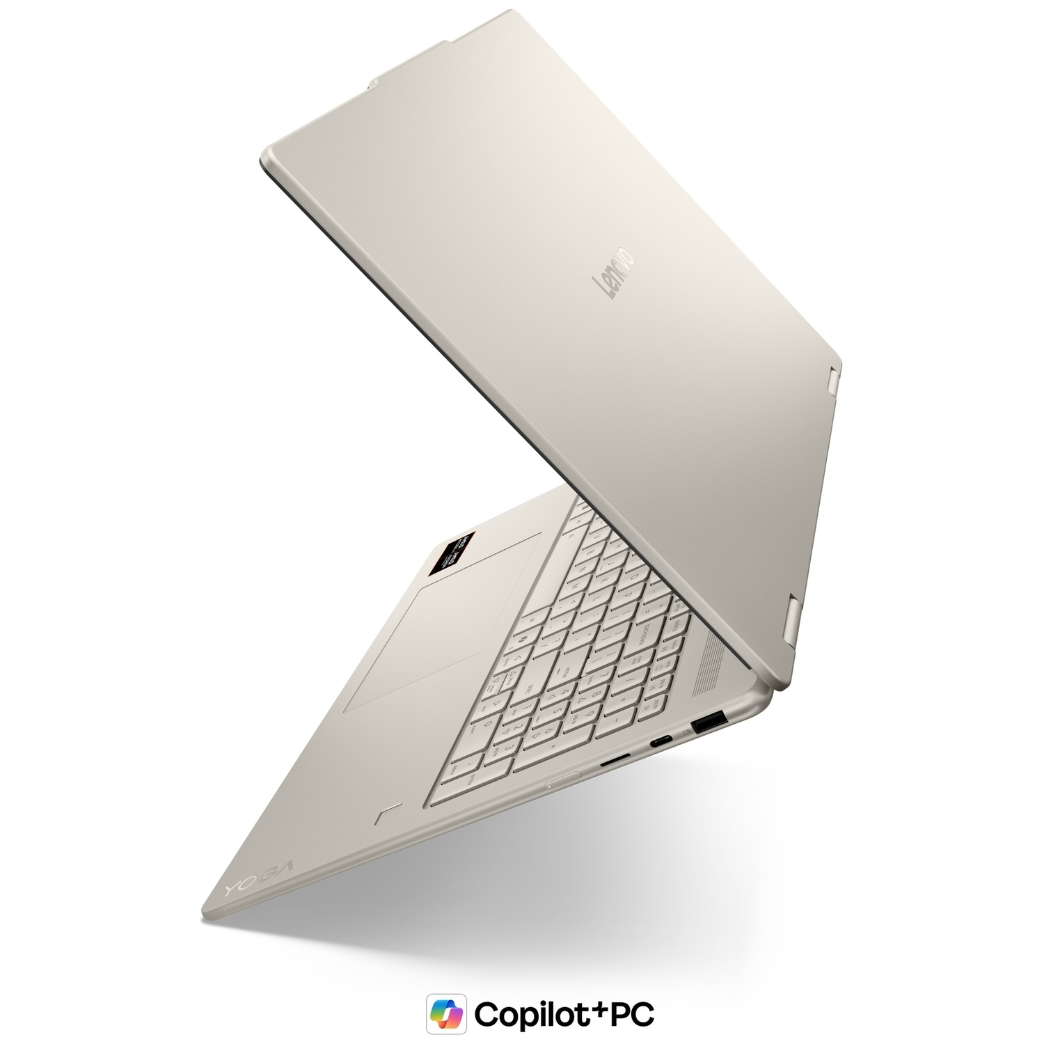 Vue latérale d'un ordinateur portable Lenovo Yoga argenté ouvert, sur fond blanc.