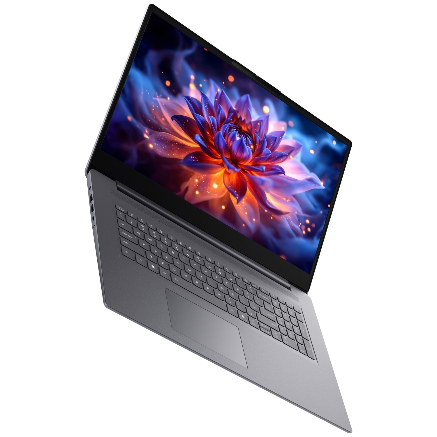 Un ordinateur portable gris avec un fond d'écran de fleurs colorées, isolé sur fond blanc.