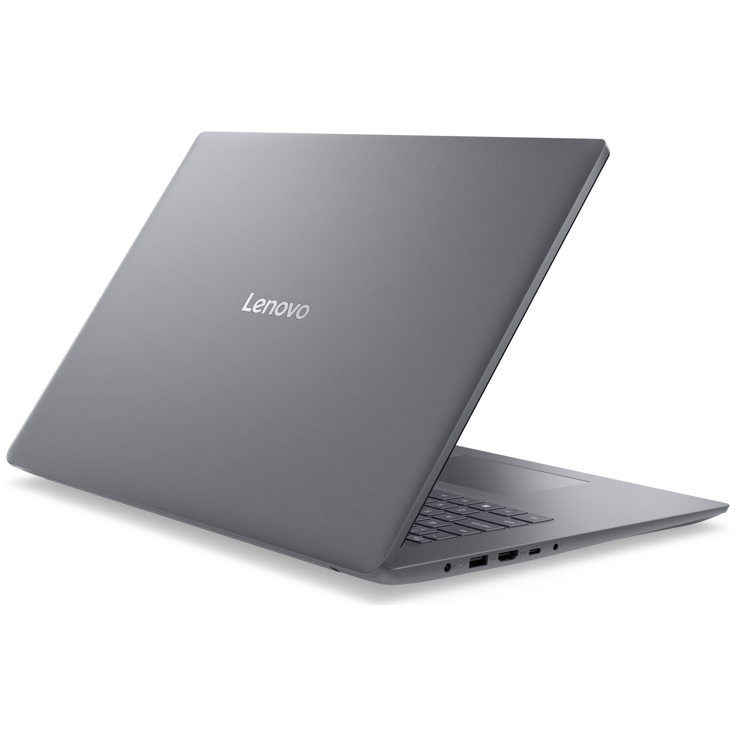 Un ordinateur portable Lenovo gris repose sur une surface blanche, clavier partiellement visible.