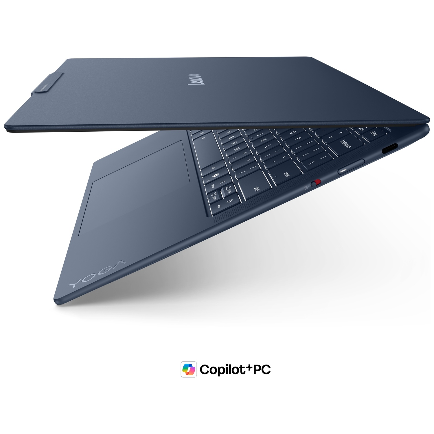 Ordinateur portable Lenovo Yoga bleu partiellement ouvert, montrant le clavier.