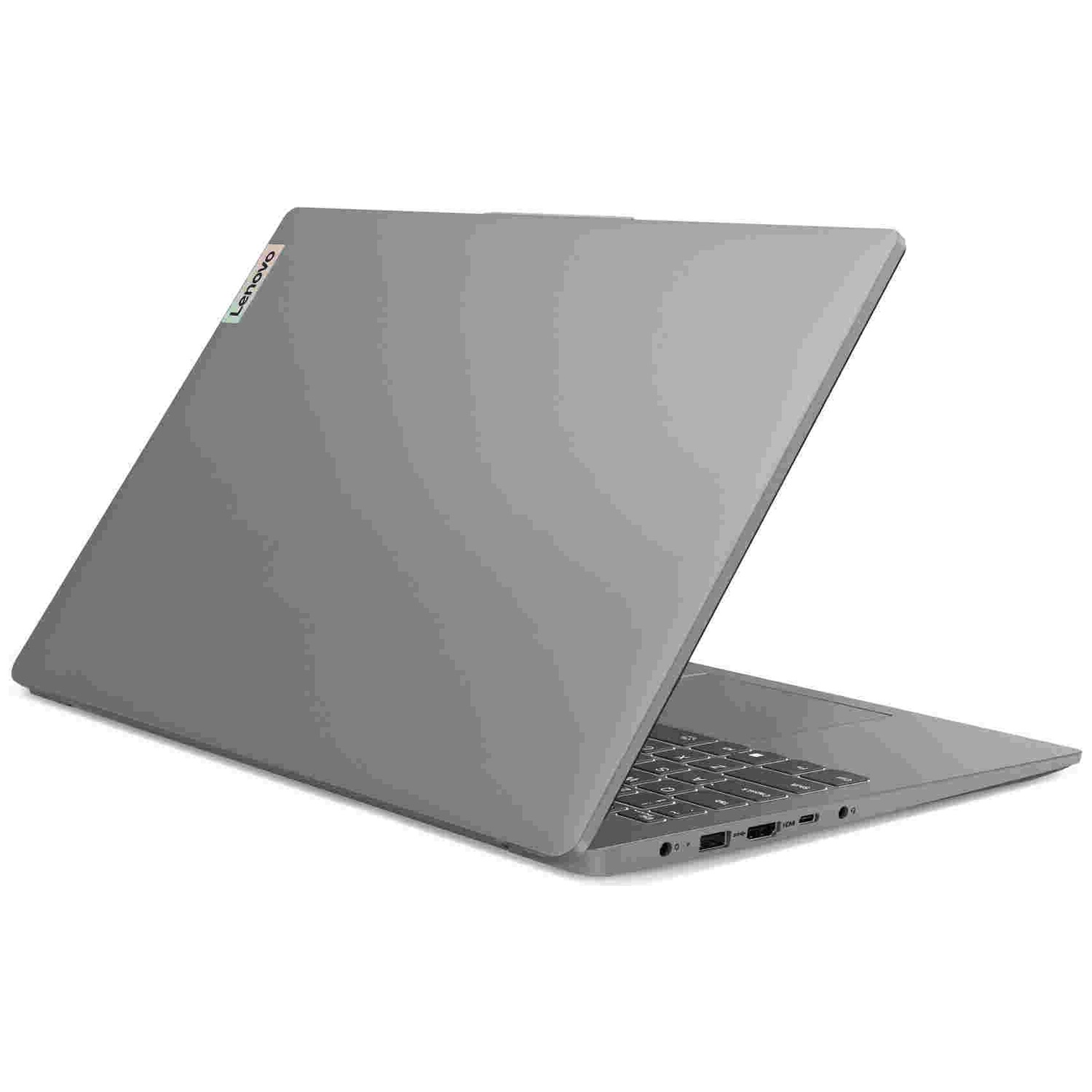 Un ordinateur portable Lenovo gris sur fond blanc, vu de dos montrant le boîtier extérieur et le clavier.