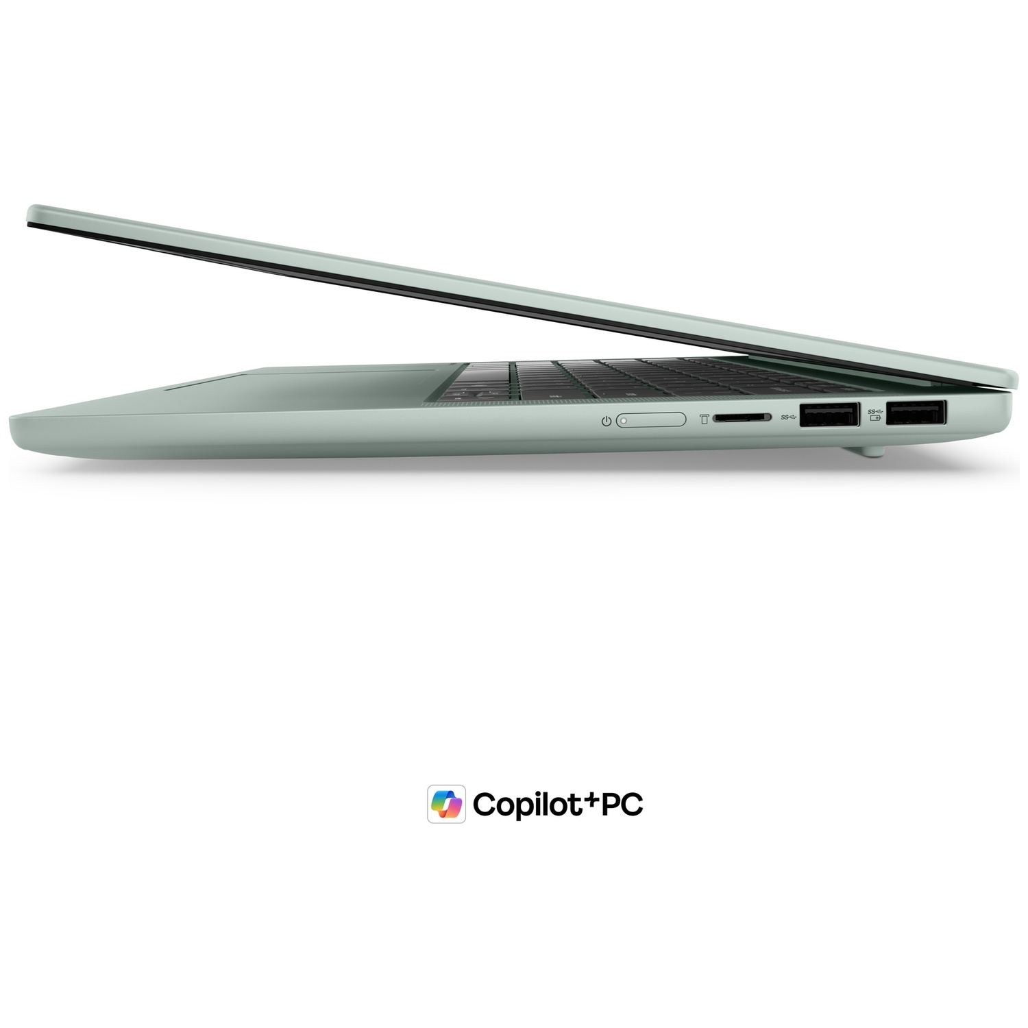 Vue latérale d'un ordinateur portable vert clair avec des ports visibles et le logo Copilot+PC en bas.