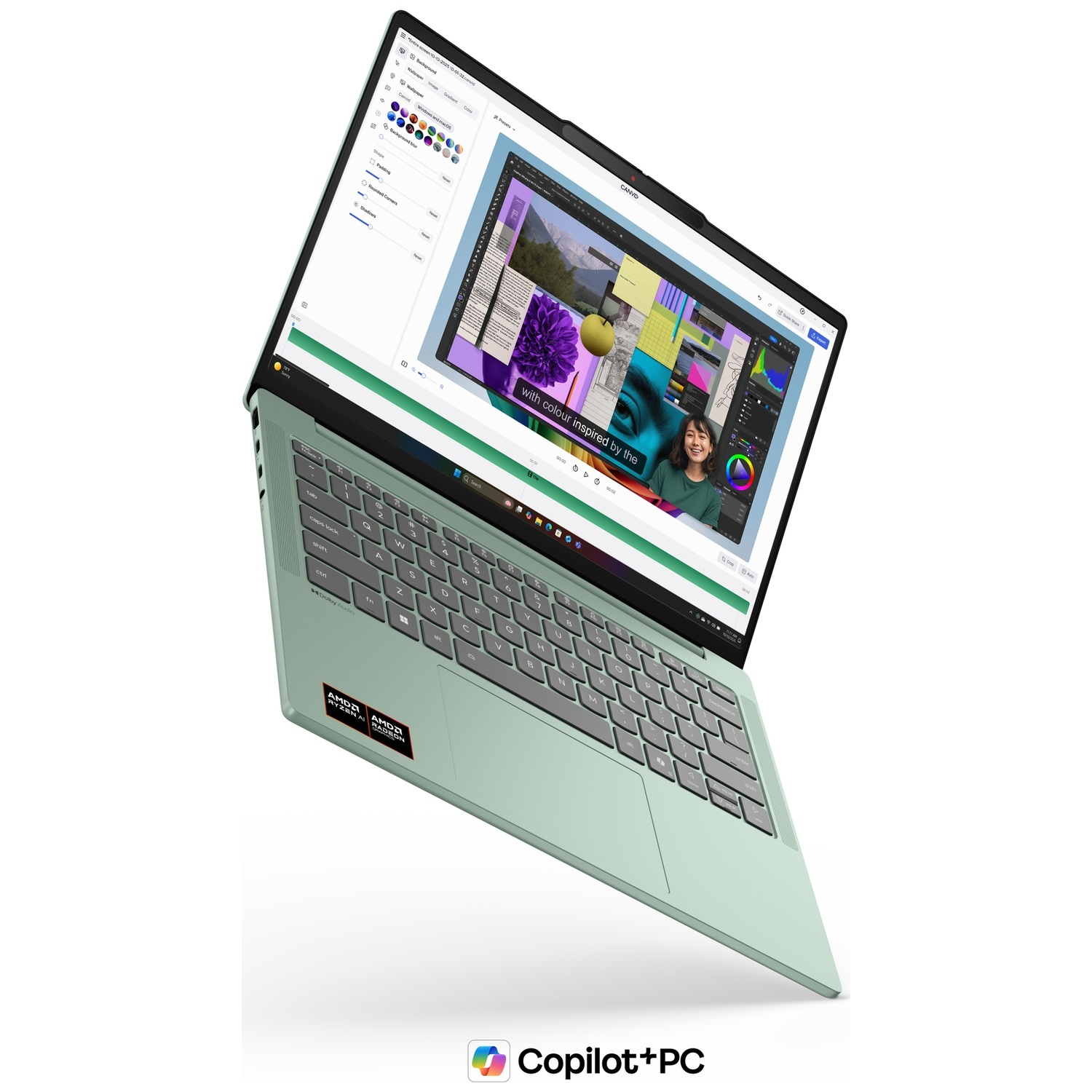 Un ordinateur portable vert menthe flotte en biais, affichant un logiciel de design à l'écran, avec les logos AMD et Copilot+PC.