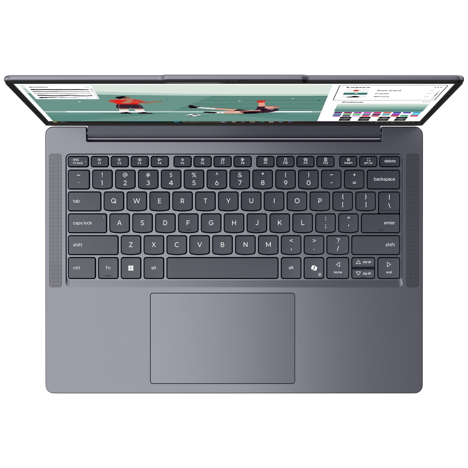 Vue de dessus d'un ordinateur portable gris avec un écran ouvert affichant une illustration et un clavier.