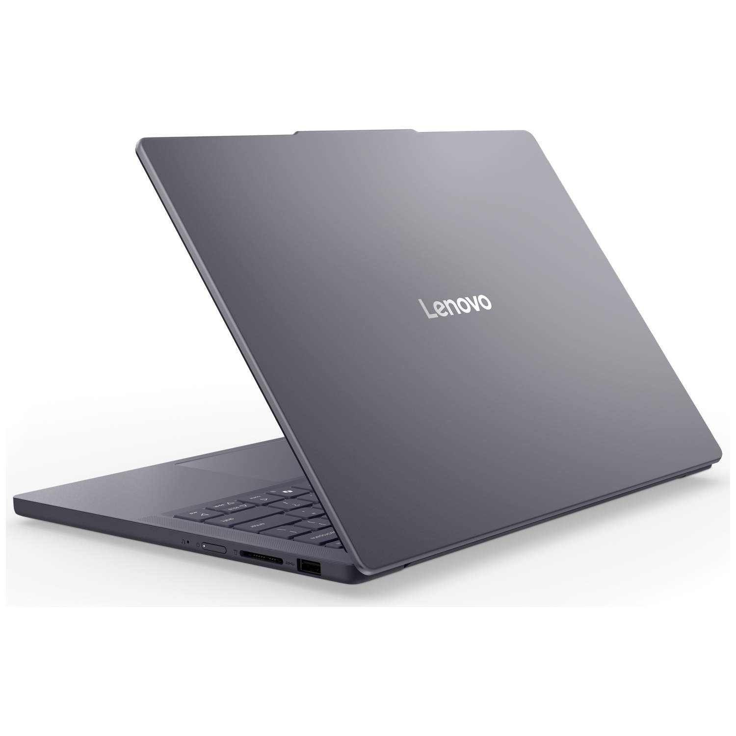 Un ordinateur portable Lenovo gris vu de dos à droite, montrant le logo et les ports.