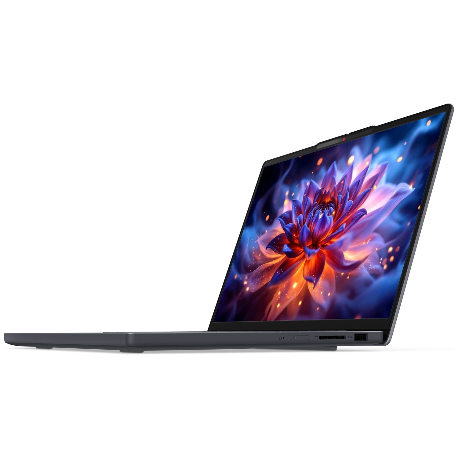 Un ordinateur portable gris foncé élégant sur une surface blanche, affichant un fond d'écran floral bleu et orange.