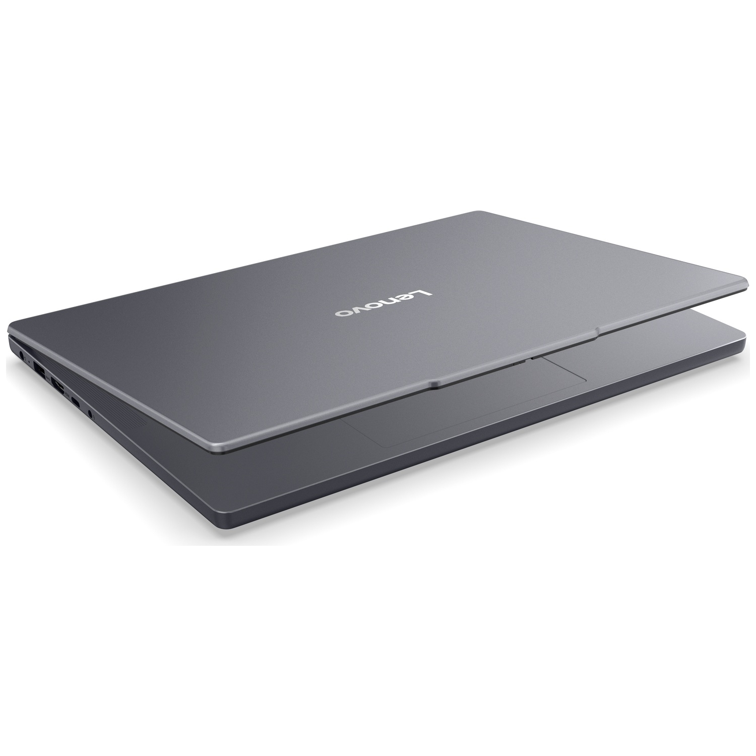Un ordinateur portable Lenovo gris fermé sur fond blanc.