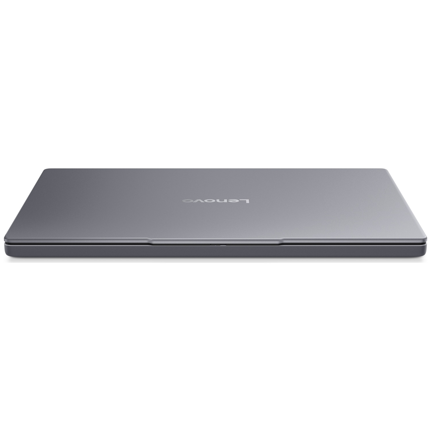 Un ordinateur portable Lenovo gris fermé sur fond blanc.