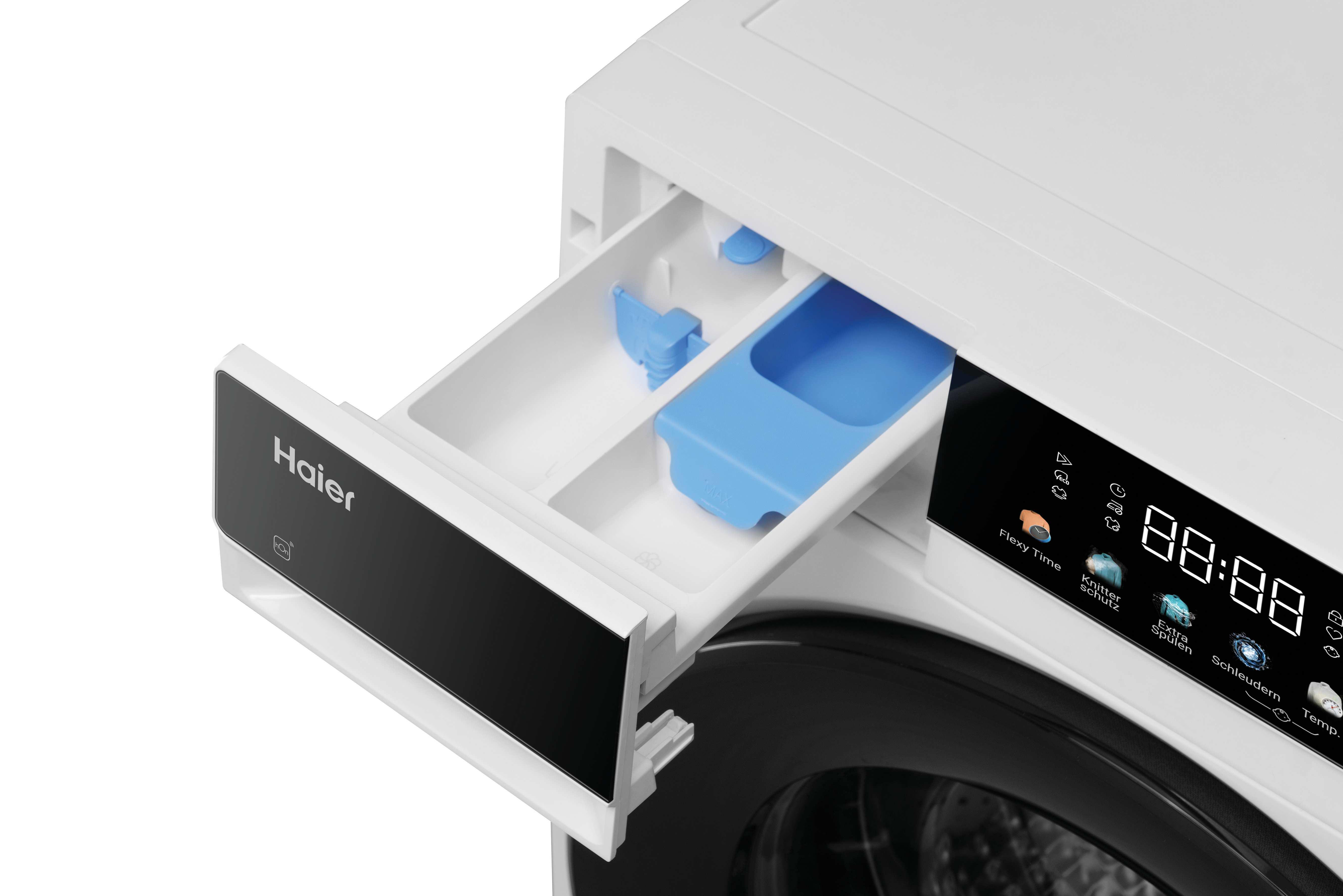 Eine geöffnete Waschmittelschublade einer weißen Haier-Waschmaschine mit blauen Einsätzen.