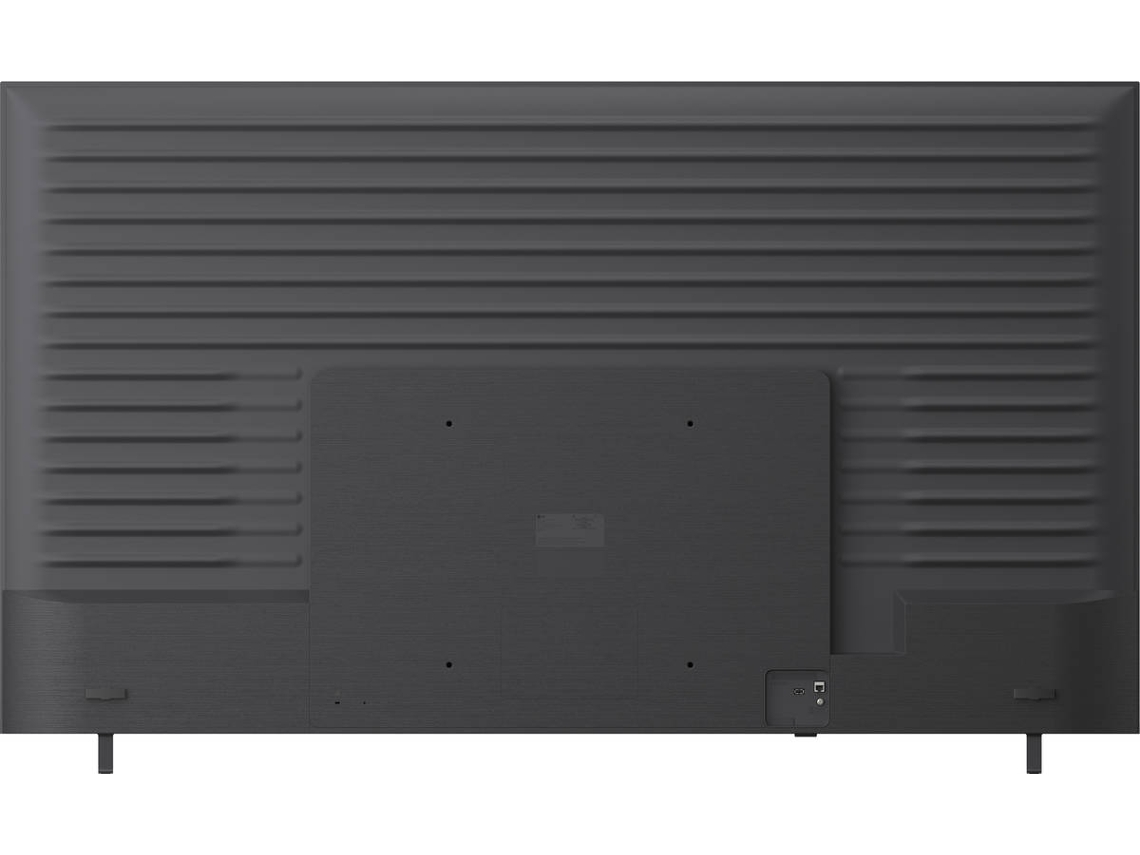 Vista trasera de un televisor negro con ranuras verticales y un panel de montaje central.