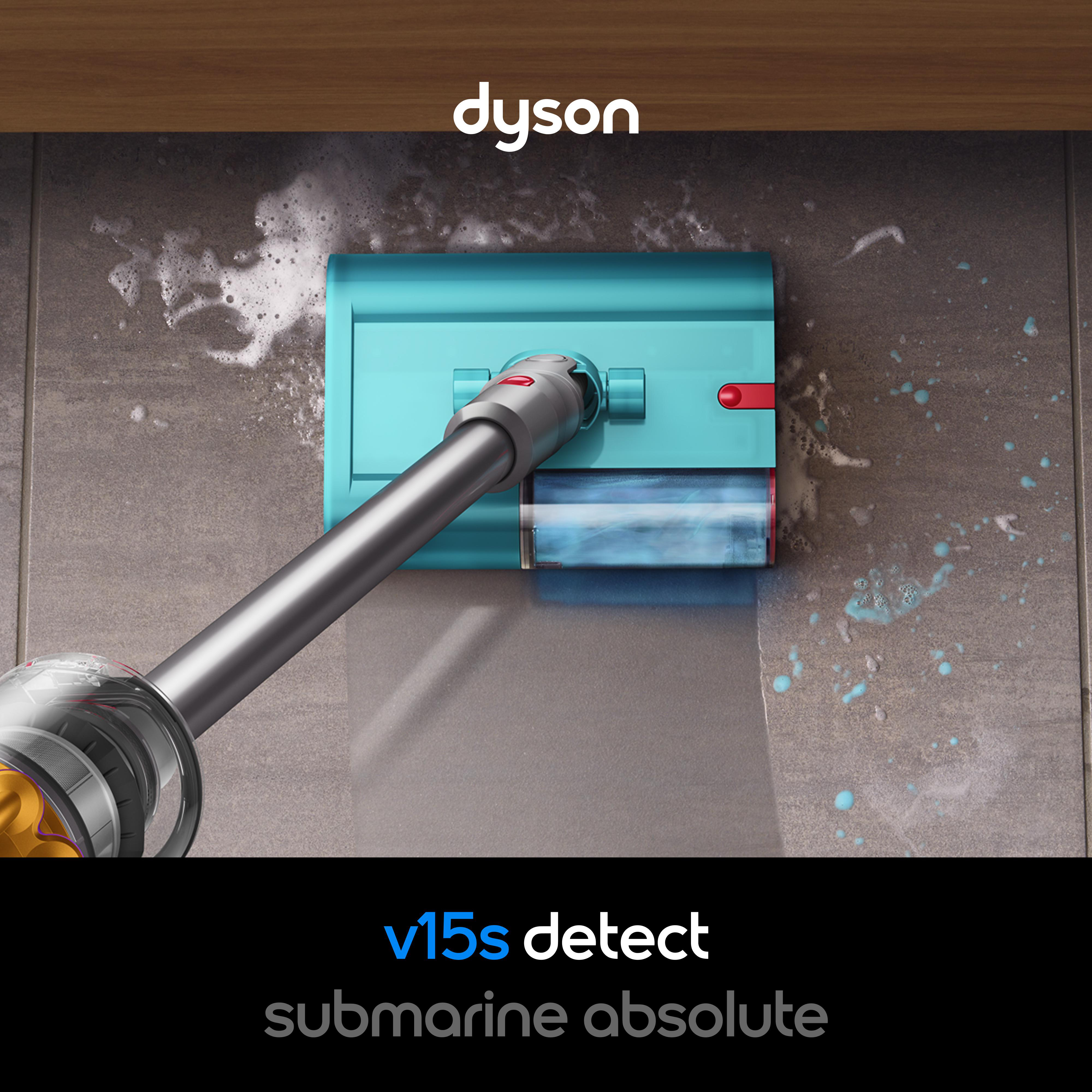 Türkisfarbener Dyson v15s detect Submarine Absolute wäscht nass einen gefliesten Boden.