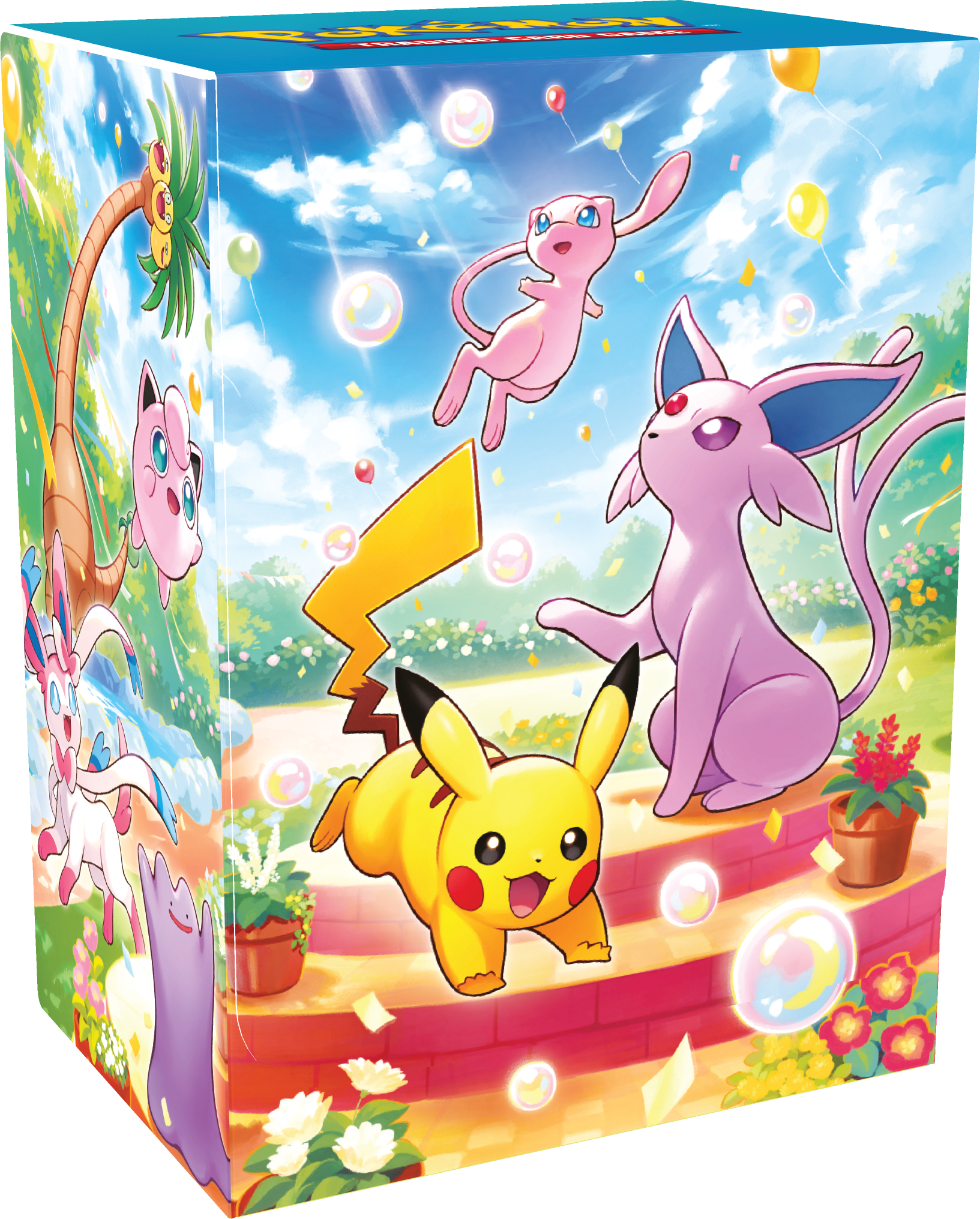 Pokémon-Sammelkartenspiel-Box mit Pikachu, Mew und Espeon im Garten mit Seifenblasen.