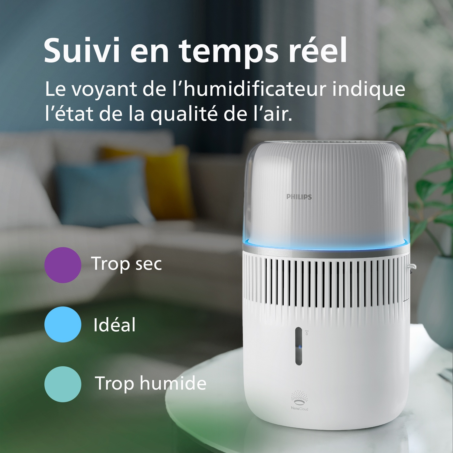 Un humidificateur Philips blanc sur une table dans un salon, avec du texte sur la qualité de l'air.