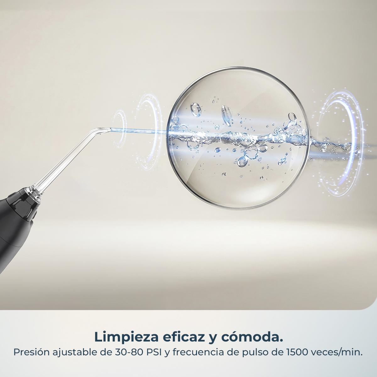 Irrigador bucal con chorro fino de agua y burbujas bajo una lupa.