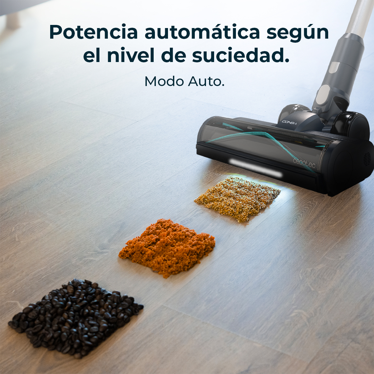 Aspiradora en suelo de madera limpiando montones de granos de café, suciedad y grano. Texto sobre potencia automática.