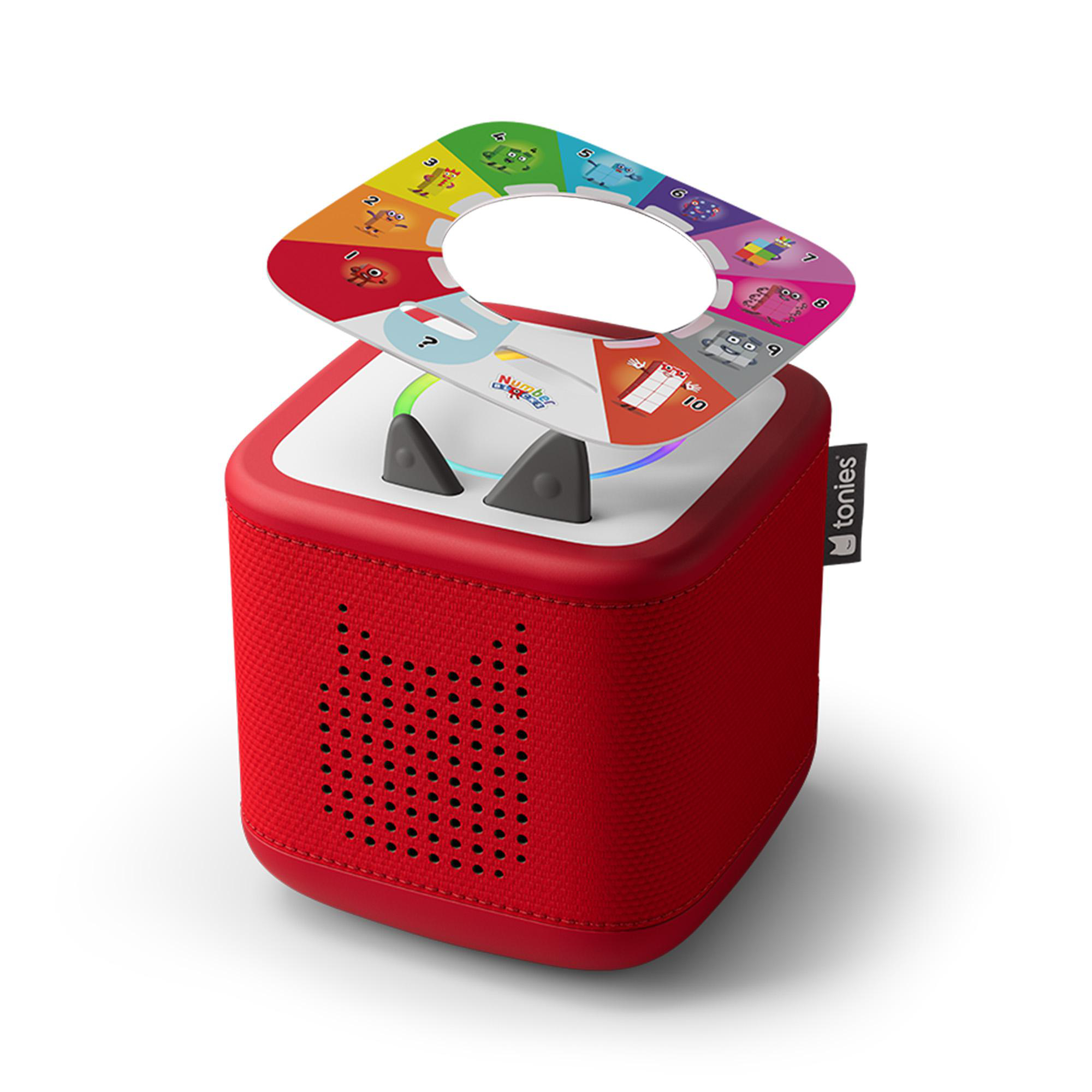 Eine rote Toniebox mit einer bunten Numberblocks-Scheibe oben drauf.